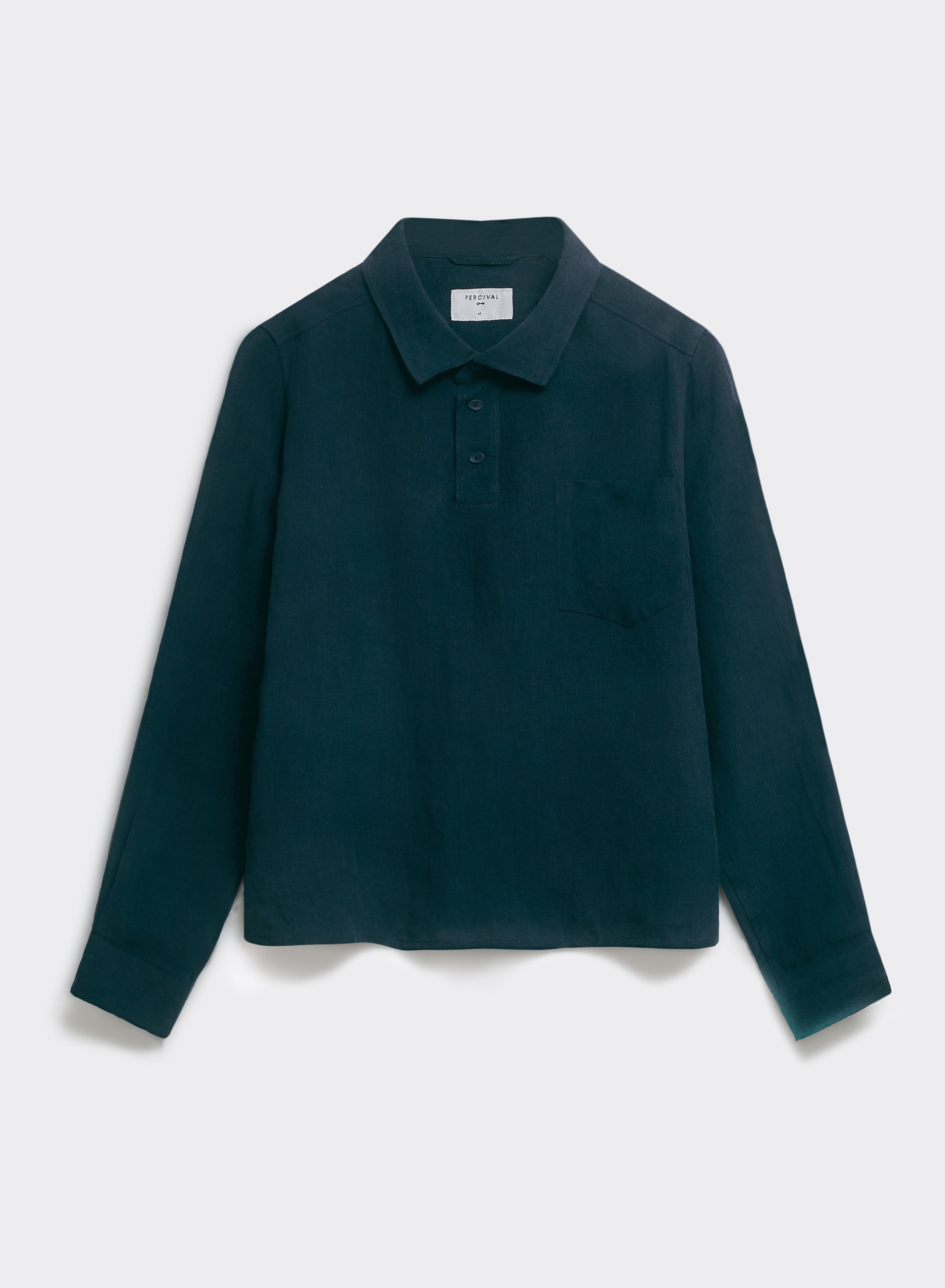 The navy Percival Alec Pullover Cropped Shirt in 100% linen, featuring a boxy hem and chest pocket, shown flat.