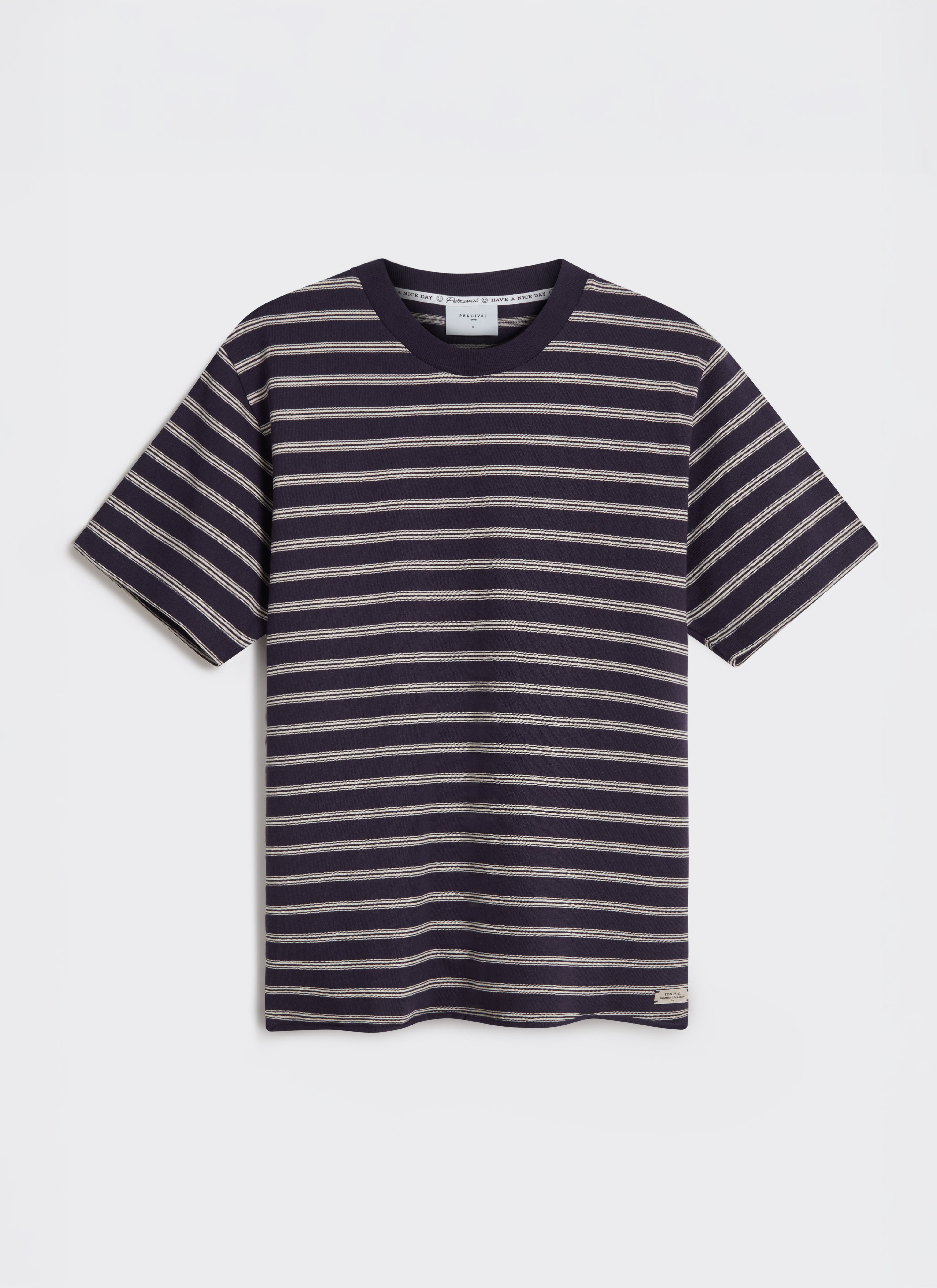 A flat lay of the Percival Arlo Raw Hem Breton T-shirt in navy organic cotton, showing the fine white horizontal stripes.