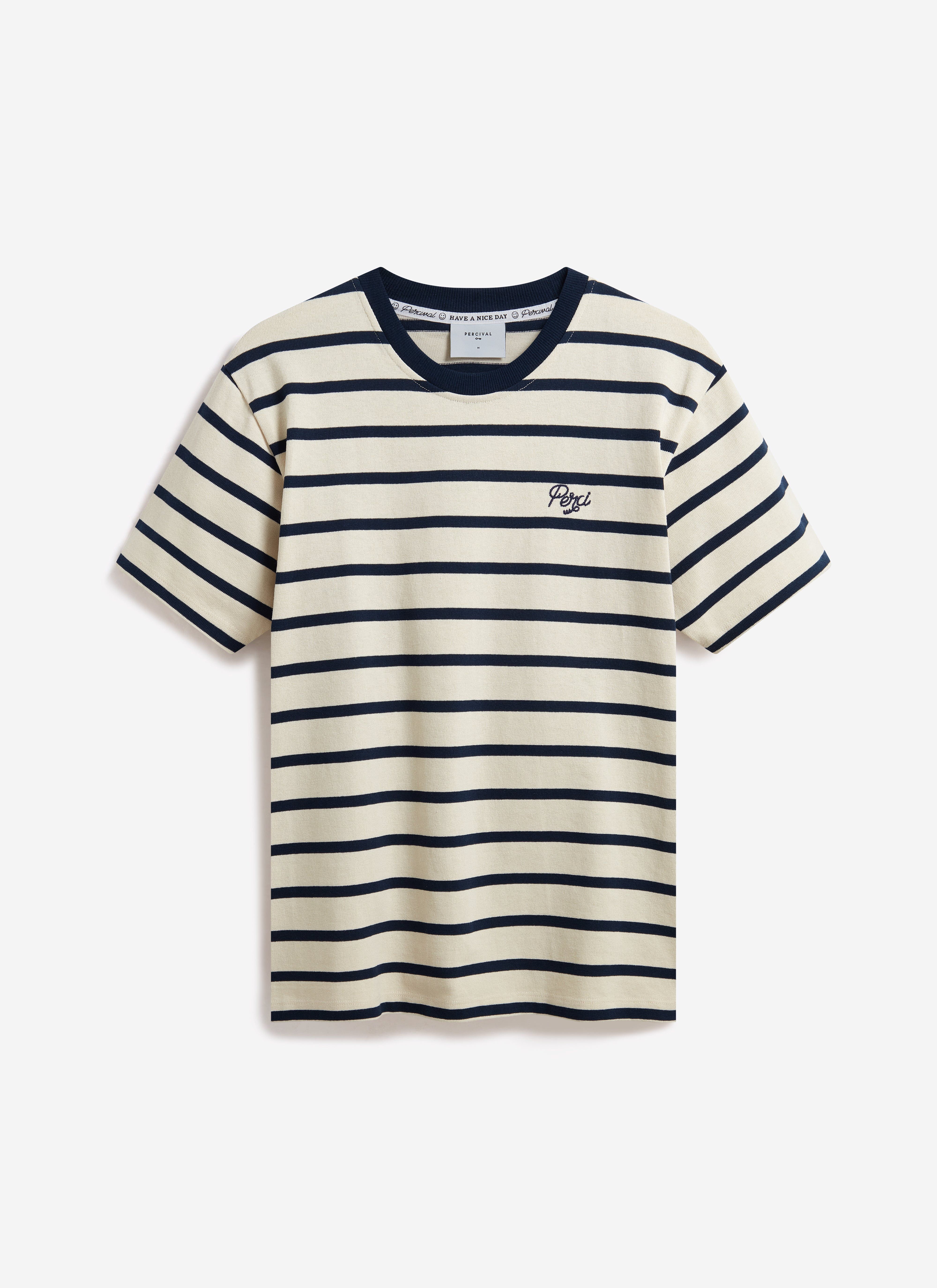 The Percival Breton Stripe T-shirt in organic cotton, laid flat to show the ecru and navy stripes and chest embroidery.