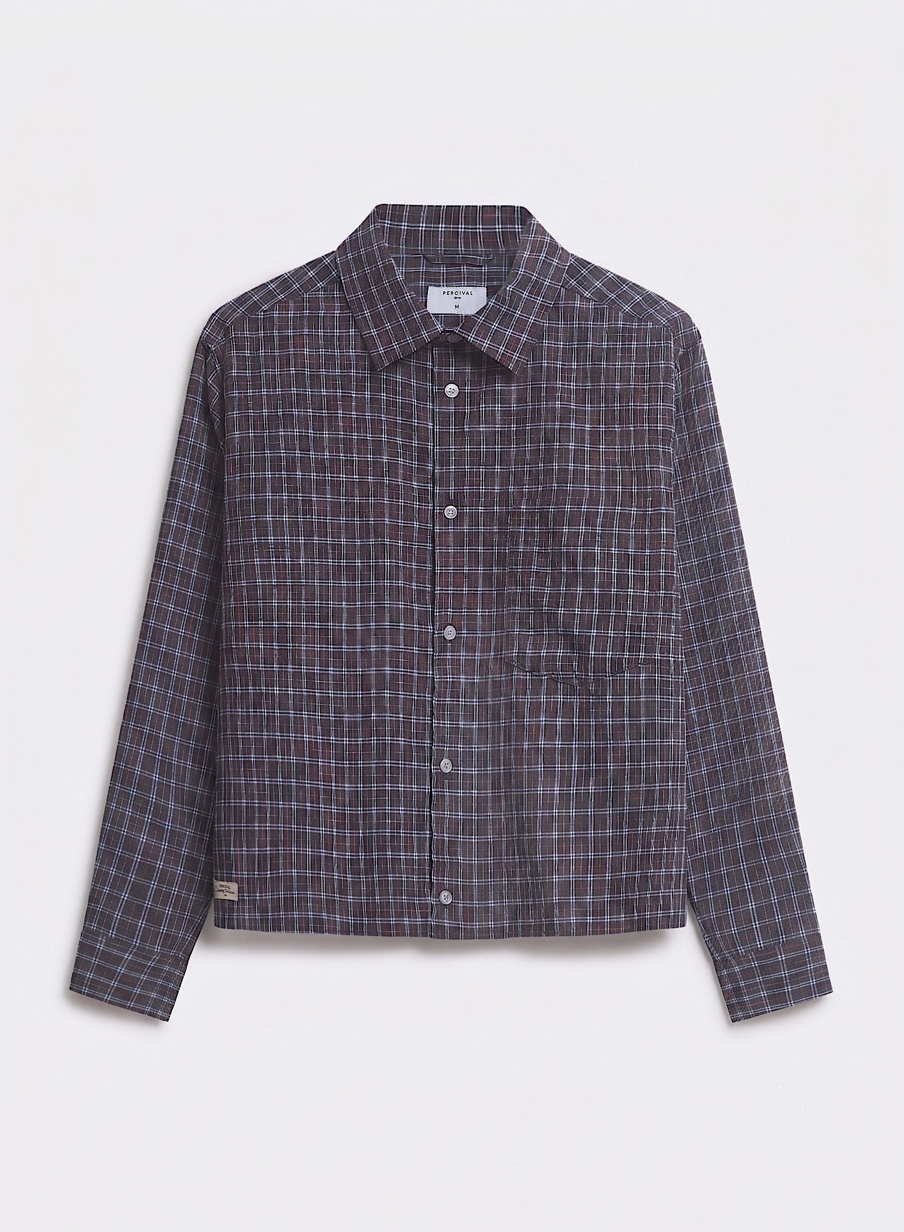 The Percival Hinsley Checked Boxy Shirt in brown cotton, featuring a point collar, chest pocket, and white buttons.