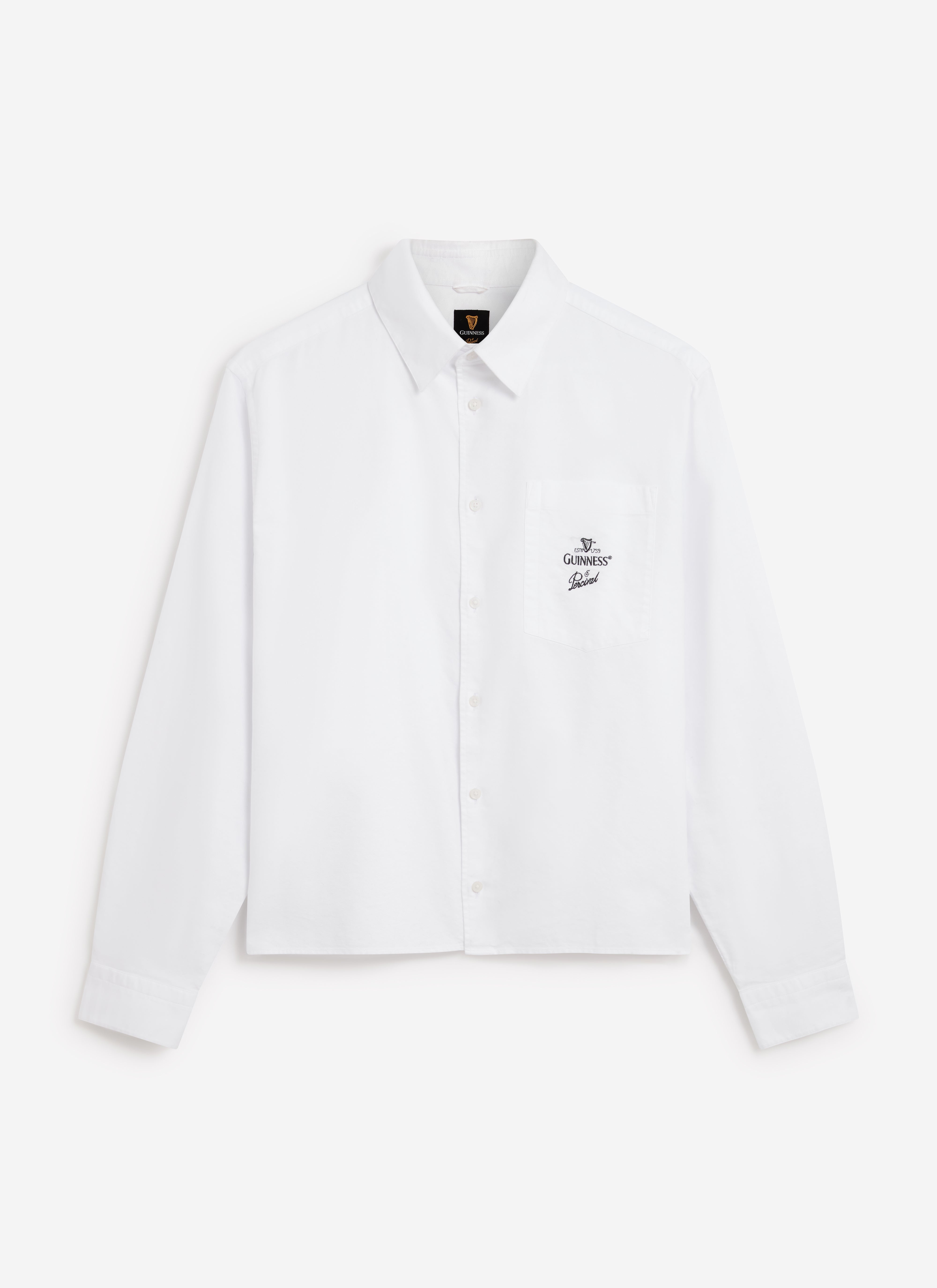 Flat lay of the Guinness x Percival Button Down Boxy Shirt in white, highlighting the collaborative embroidery on the pocket.