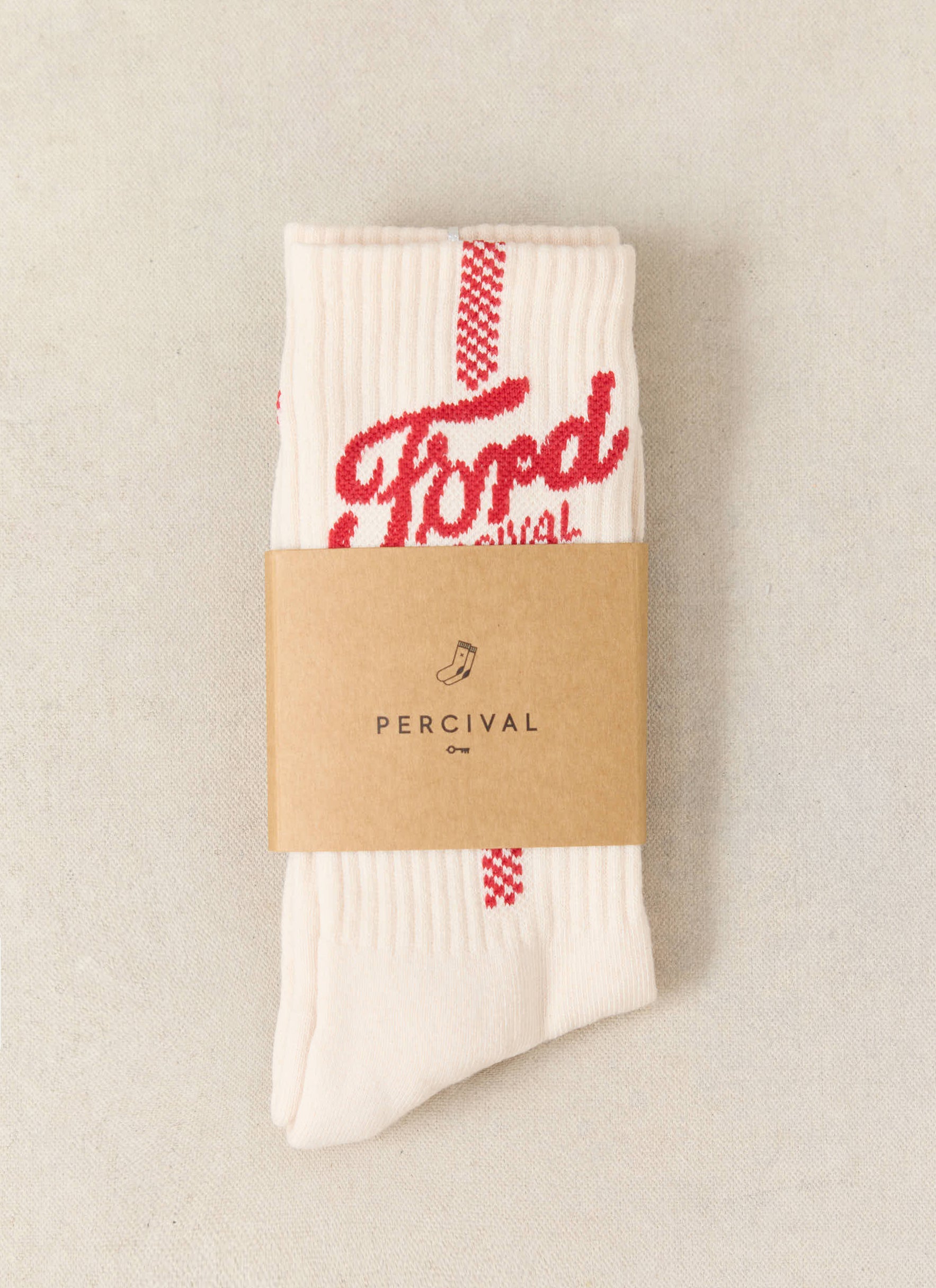 Cream cotton-blend Ford x Percival socks with red checkerboard jacquard and logo details in branded packaging.