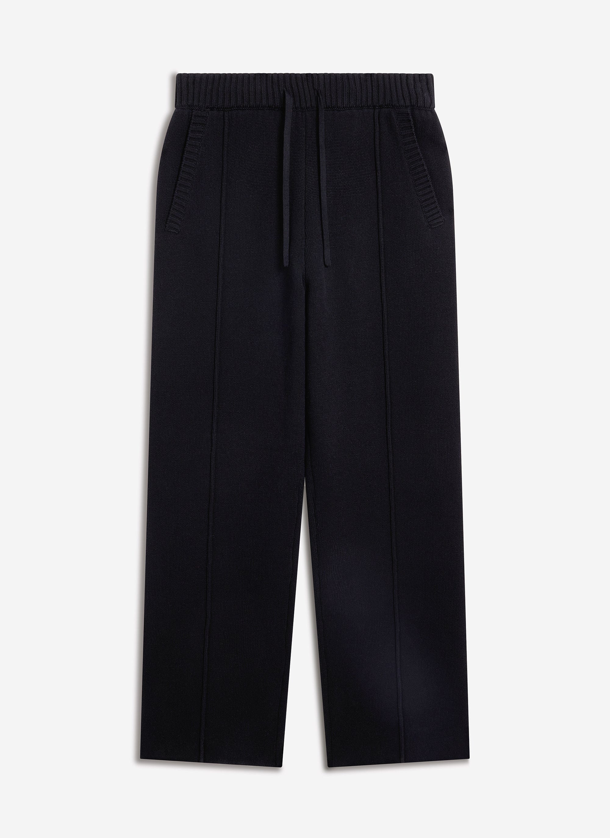 The Percival Chronicle Knitted Straight Leg Trackpant in black cotton, shown in a flat lay studio photograph.