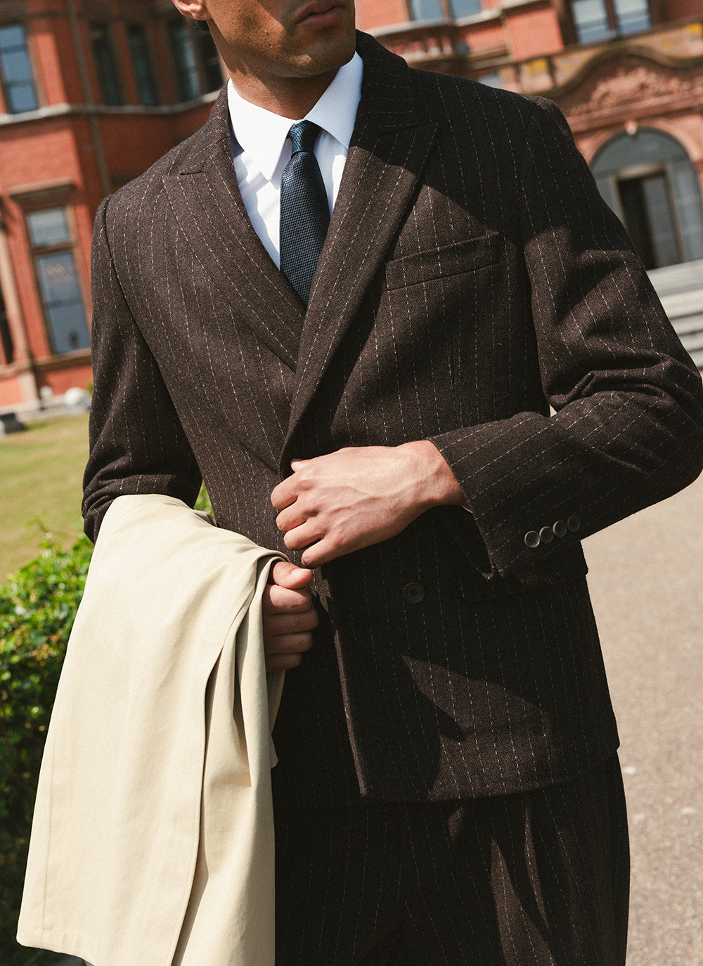 Percival Clifton Pinstripe Double Breasted Blazer and Trousers in Espresso with a Navy Grenadine Silk Tie.