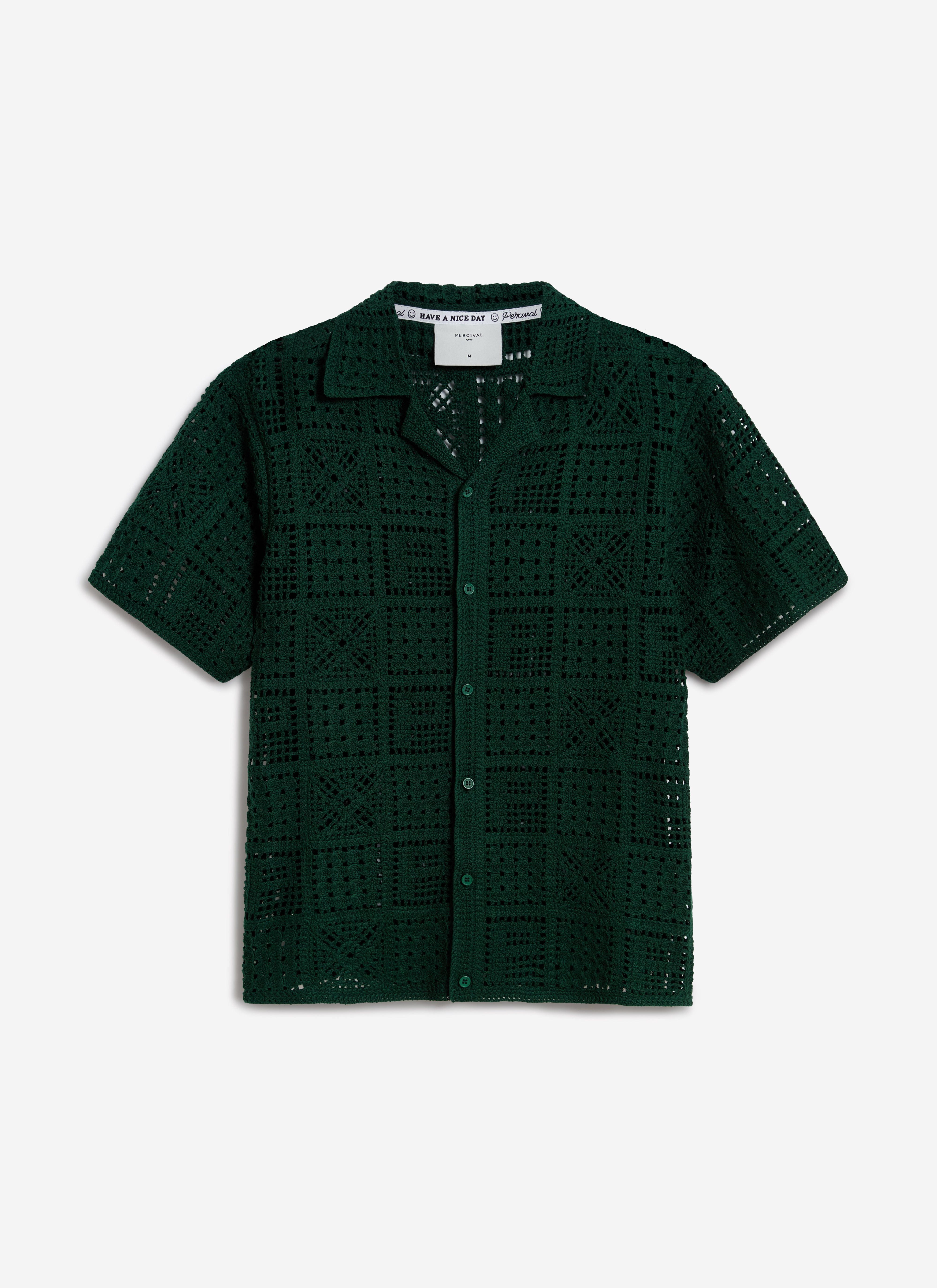 A flat lay of the Percival Crochet Groundsman Shirt in forest green, showing its cotton crochet knit and Cuban collar.