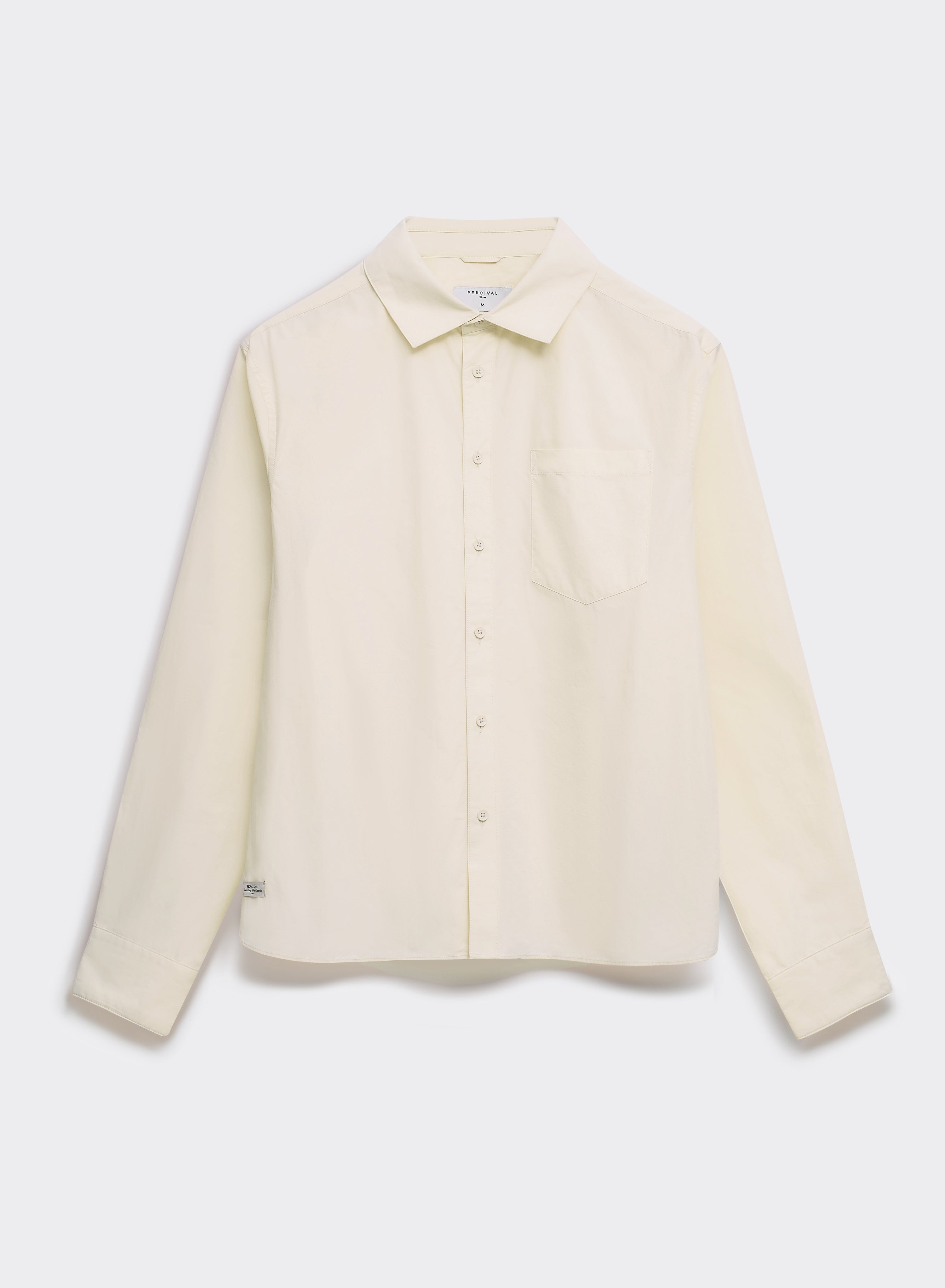 The cream Percival Dali Relaxed Poplin Shirt, a cotton long-sleeve button-down, displayed against a light grey background.