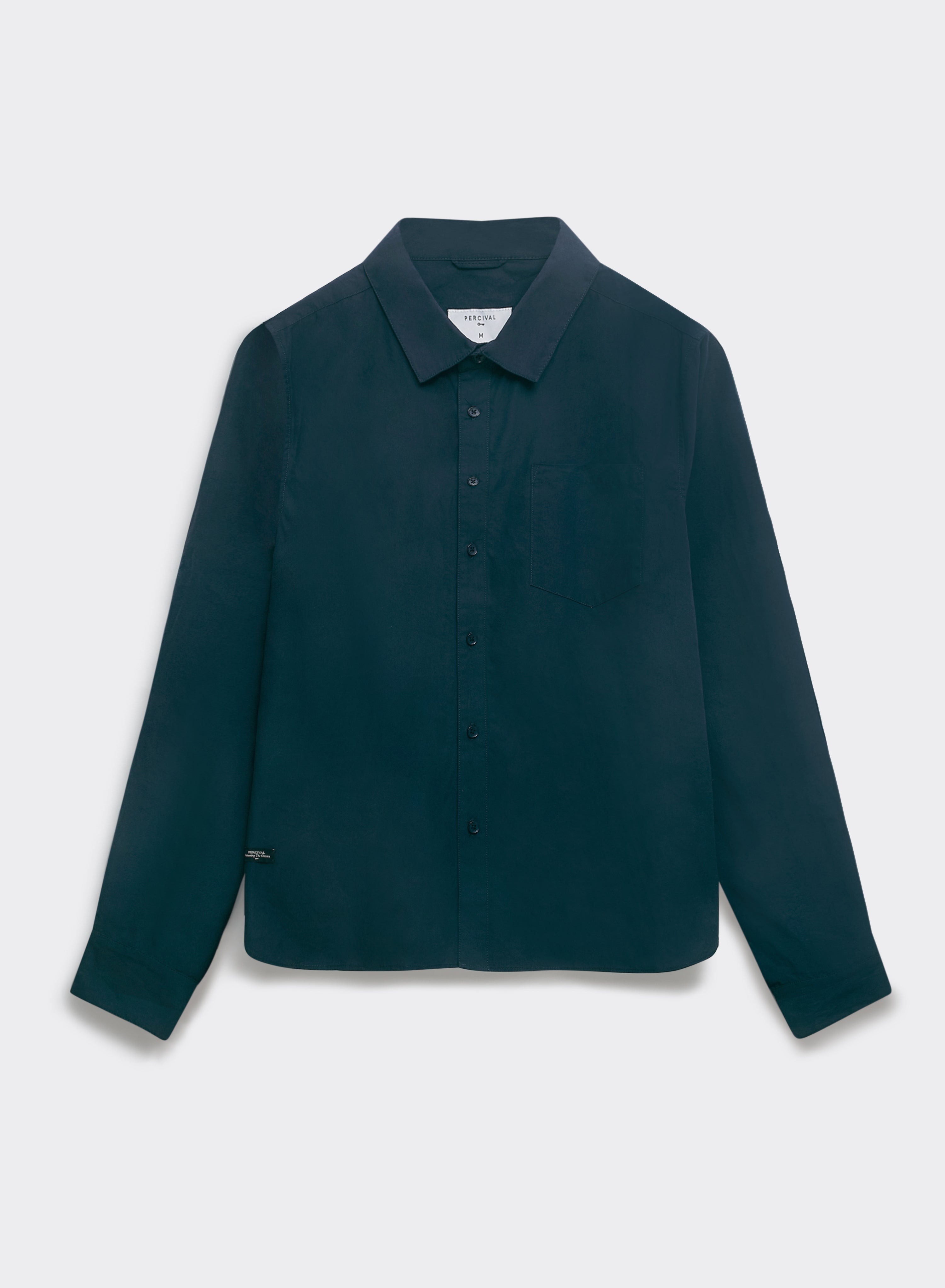 The navy blue Percival Dali relaxed poplin shirt in paper-touch cotton, with a chest pocket and point collar, shown flat.