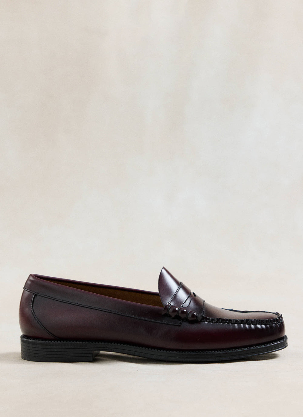 G.H. Bass Easy Weejun Larson penny loafer in polished wine leather with handsewn detailing.