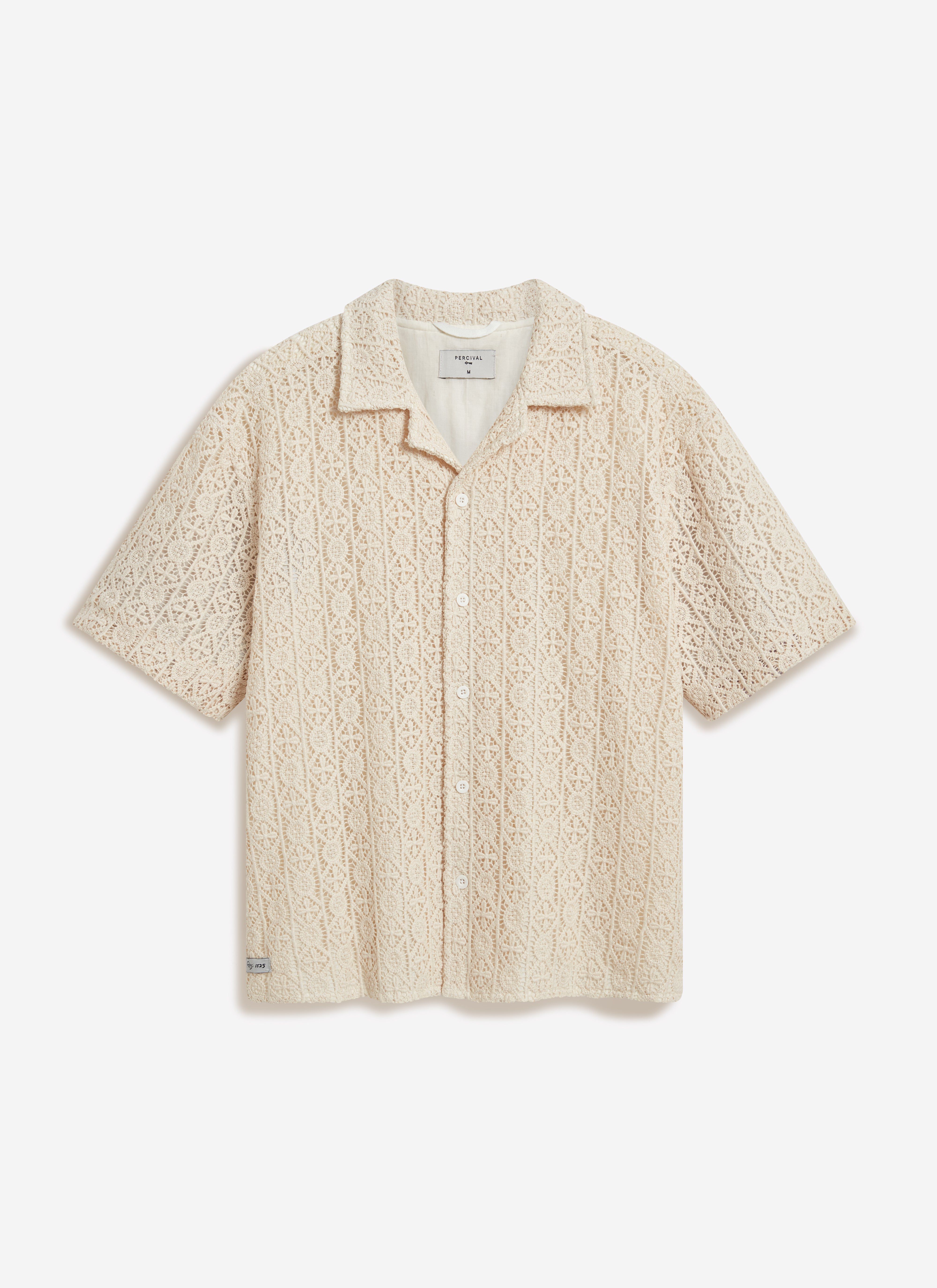 The Percival Elio Crochet Cuban Shirt in ecru, a short-sleeved button-down with an intricate all-over crochet pattern.