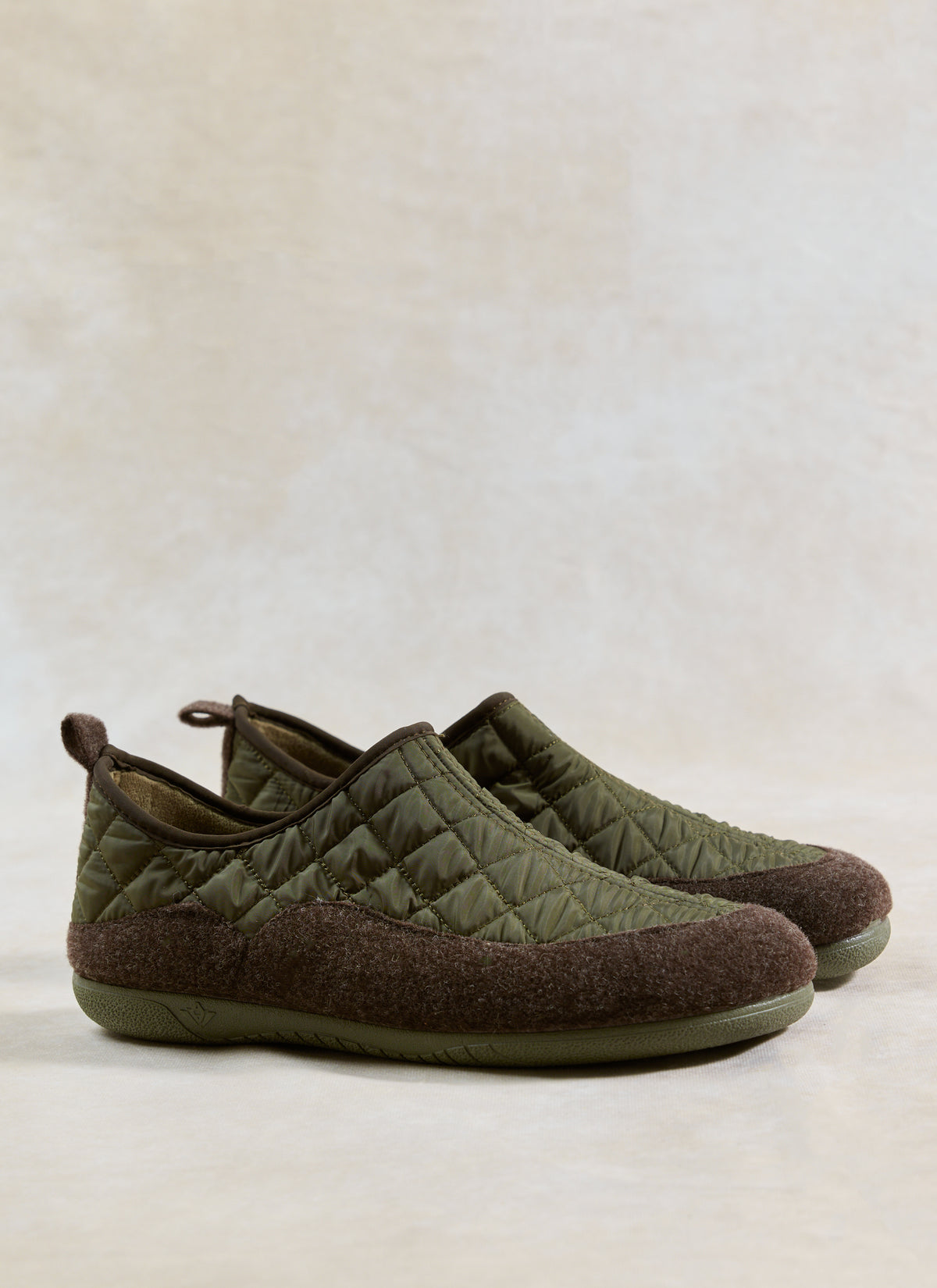 A pair of Gurus Valencia Classic Homeshoes in khaki quilted nylon with brushed felt foxing tape.