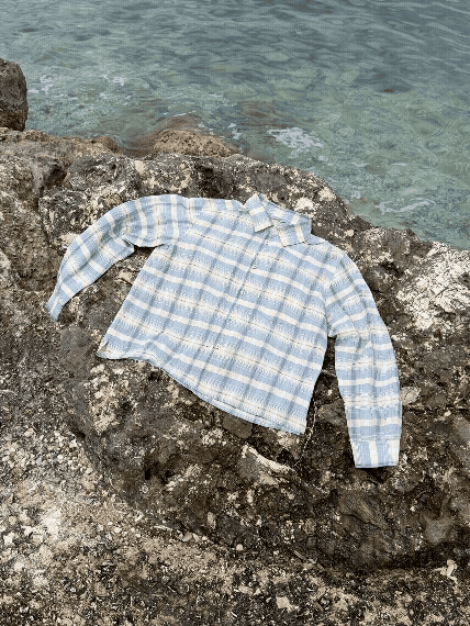 Percival Jesse Cropped Shirt in light blue check, a boxy linen-cotton blend shirt with a chest pocket and point collar.