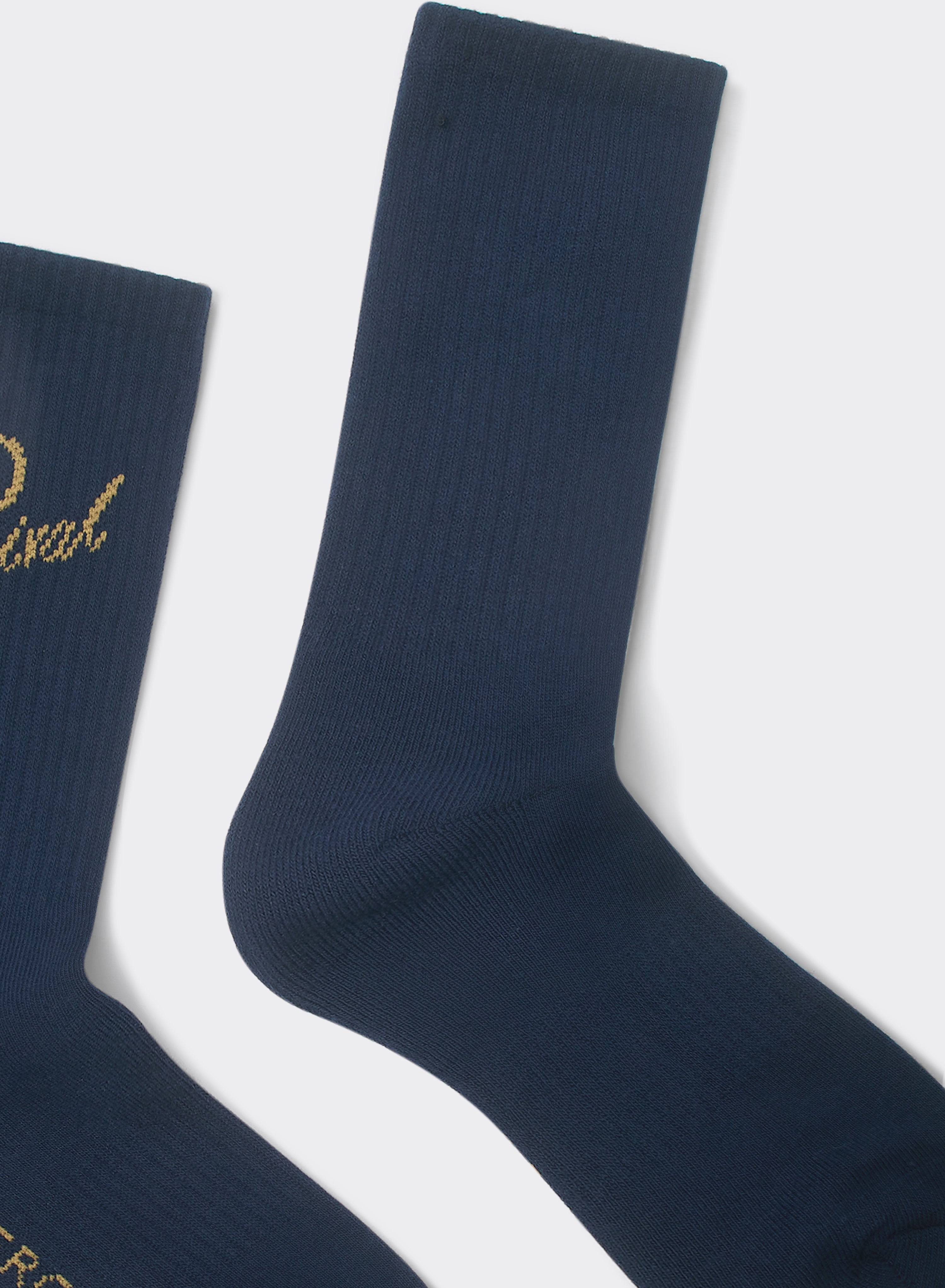 Navy Percival Kingsley Jacquard socks in a ribbed cotton-blend, featuring gold-tone script branding on a white background.