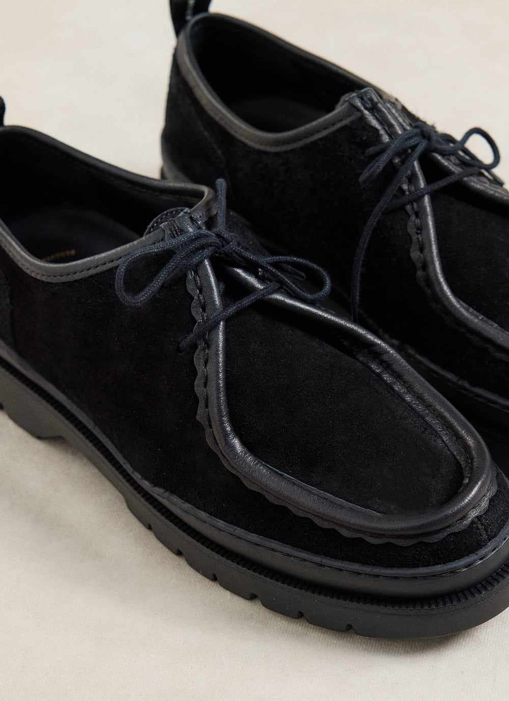 Close-up of the black Kleman Major VP Oak 2 suede shoes featuring stitched moc-toe detailing and chunky rubber soles.