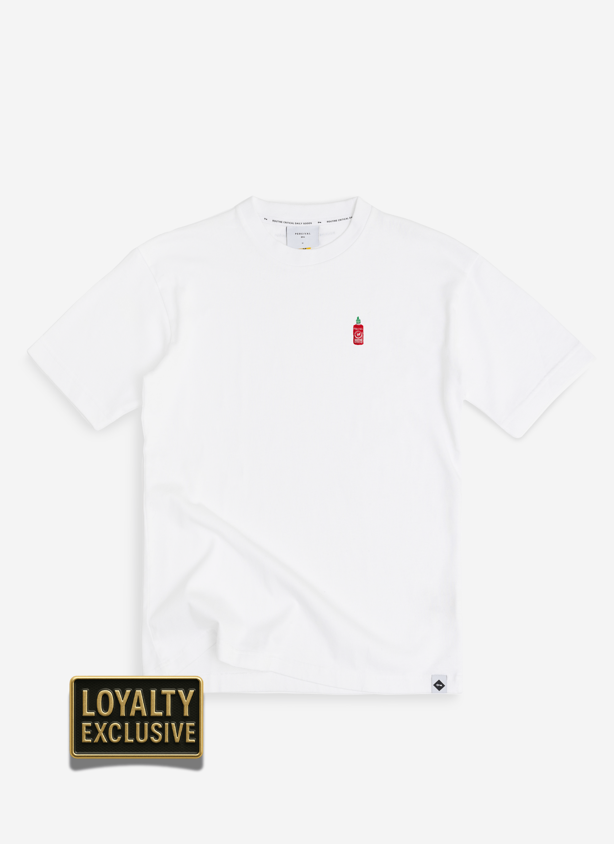 The Percival Loyalty Exclusive T-shirt in white, featuring a small embroidered hot sauce bottle on the chest.