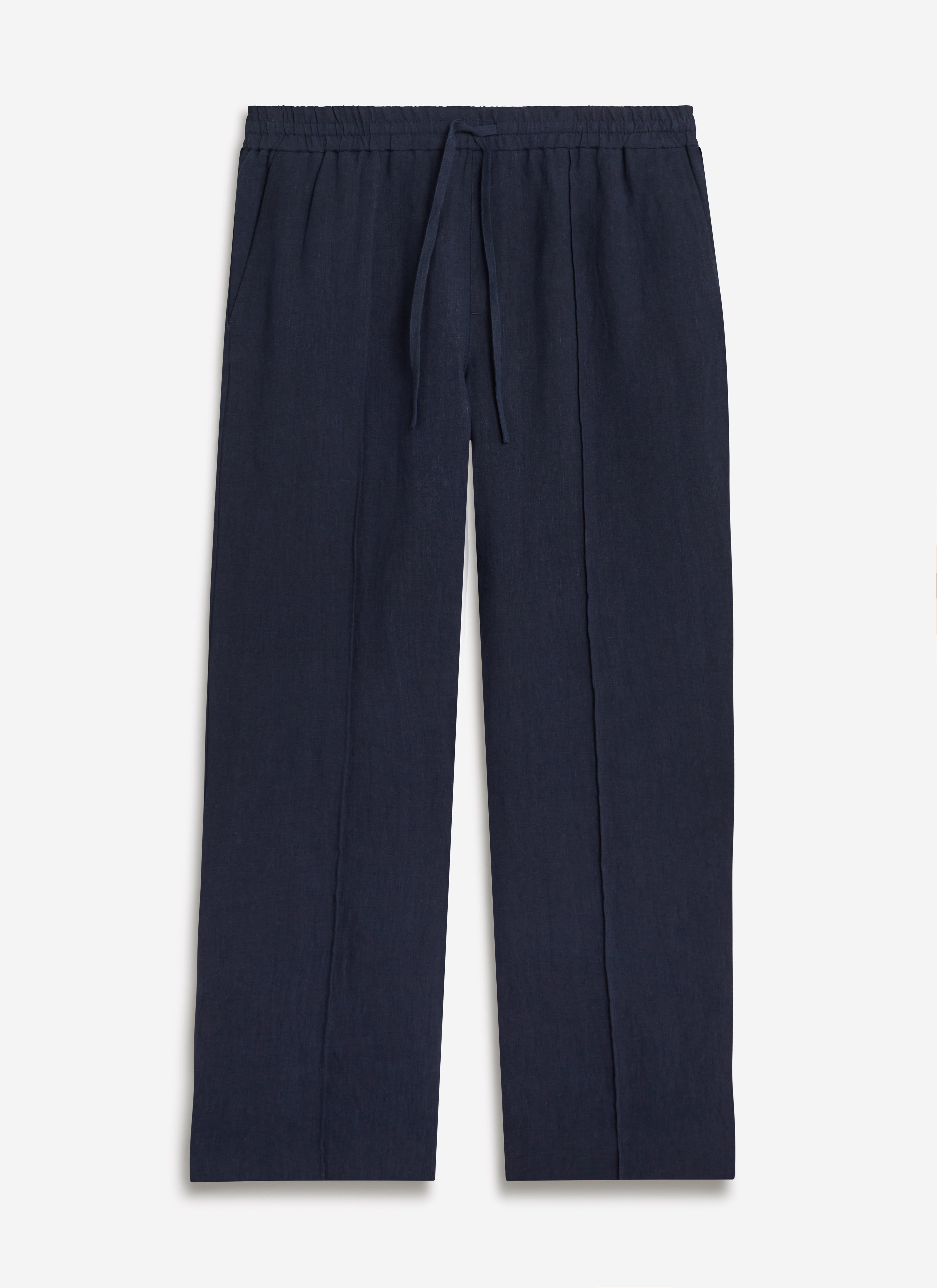 A flat lay of the Percival Lorena Wide Leg Trousers in navy linen, showing the comfortable elasticated drawstring waist.