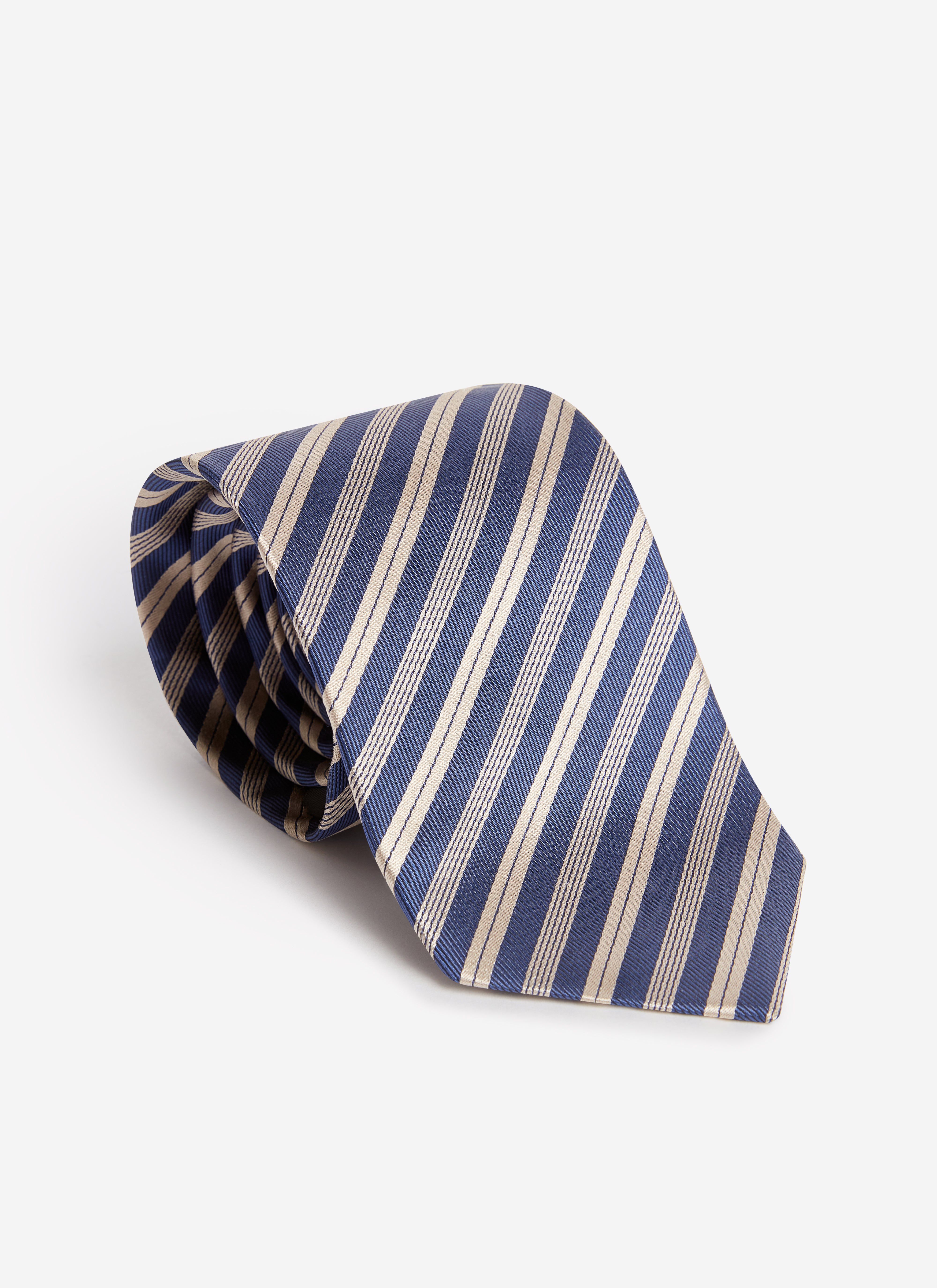A studio shot of the Percival Micro Stripe Silk Tie in navy and beige, coiled on a white background to show its texture.