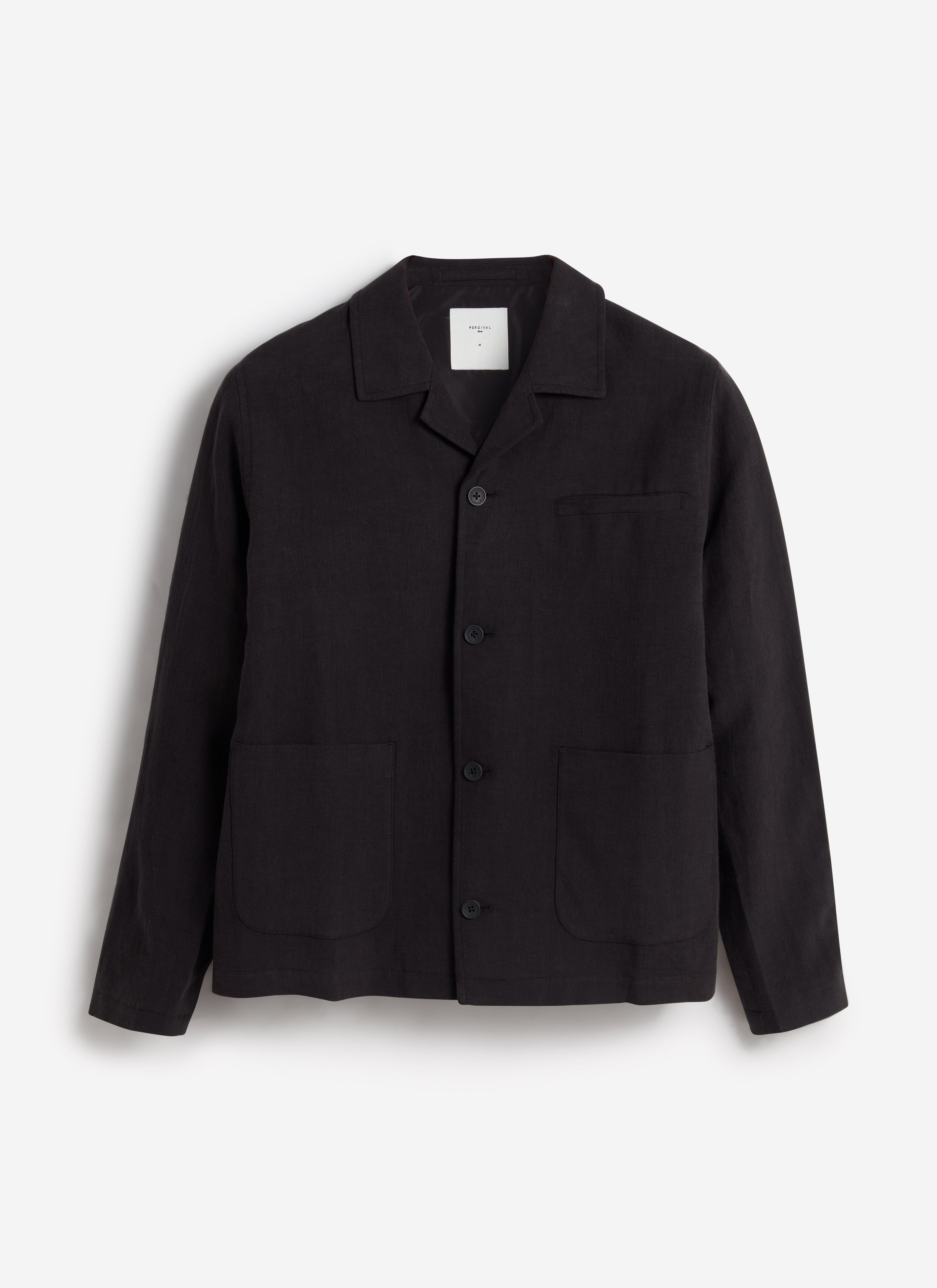 A flat lay of the Percival Linen Overshirt in black, showing its button front, collar and three front pockets.