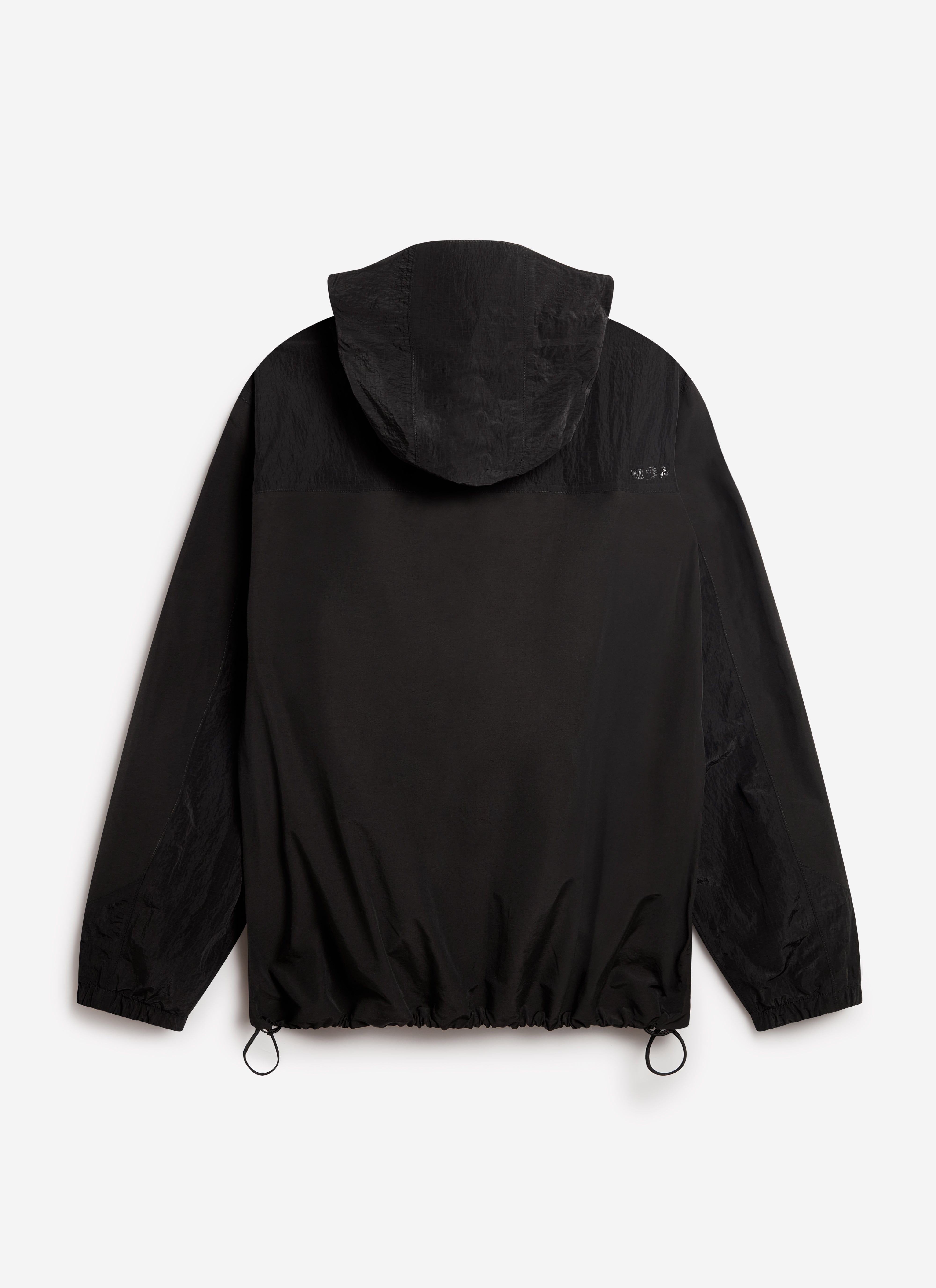 The back of the PCVL Zip Through Water Resistant Jacket in black by Percival, showing the hood and drawcord hem.