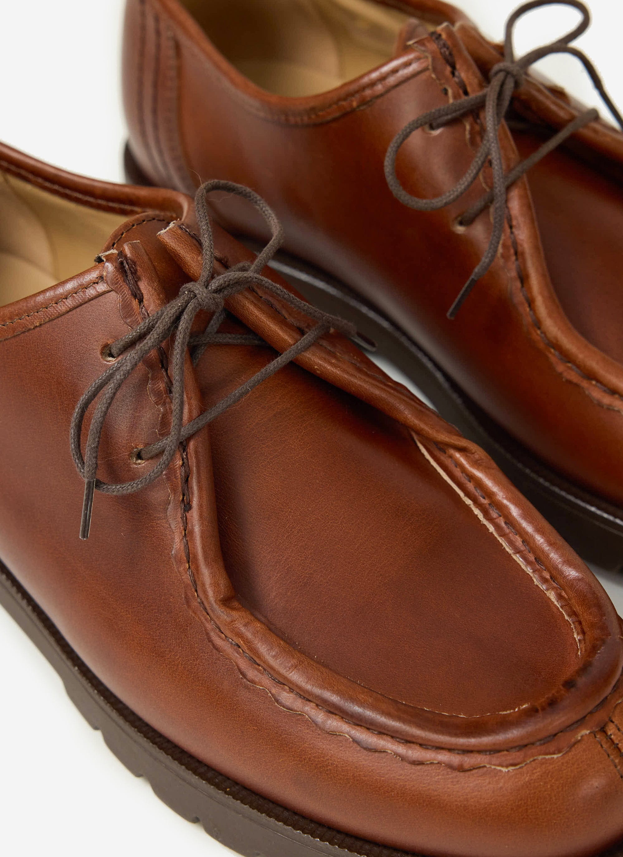 A close-up of the Percival Kleman Padror TH Shoe in cognac leather, highlighting its serrated hem and detailed stitching.