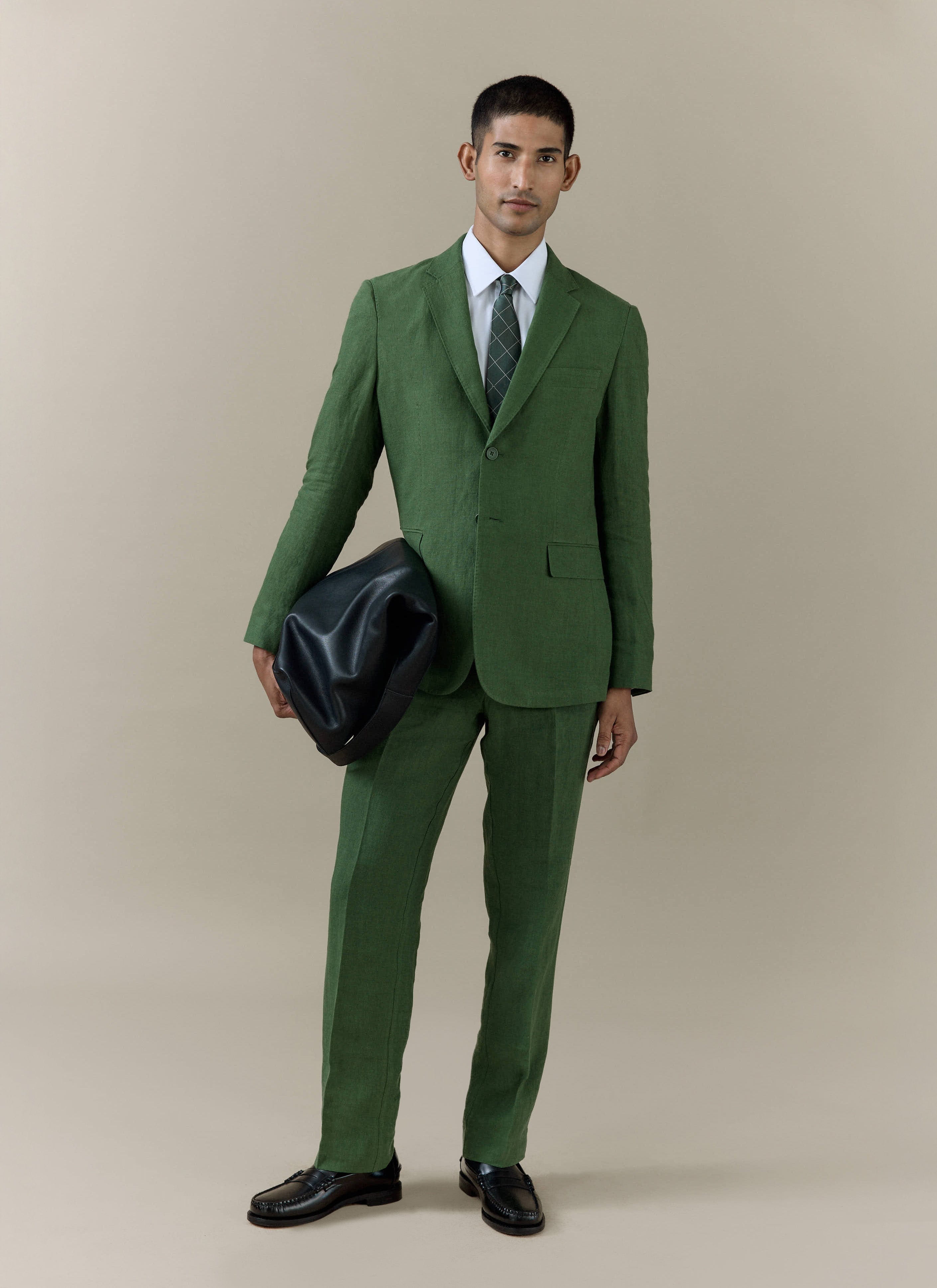 Percival Slim Fit Classic Blazer in forest green linen, styled as a full suit with matching trousers and a white shirt.