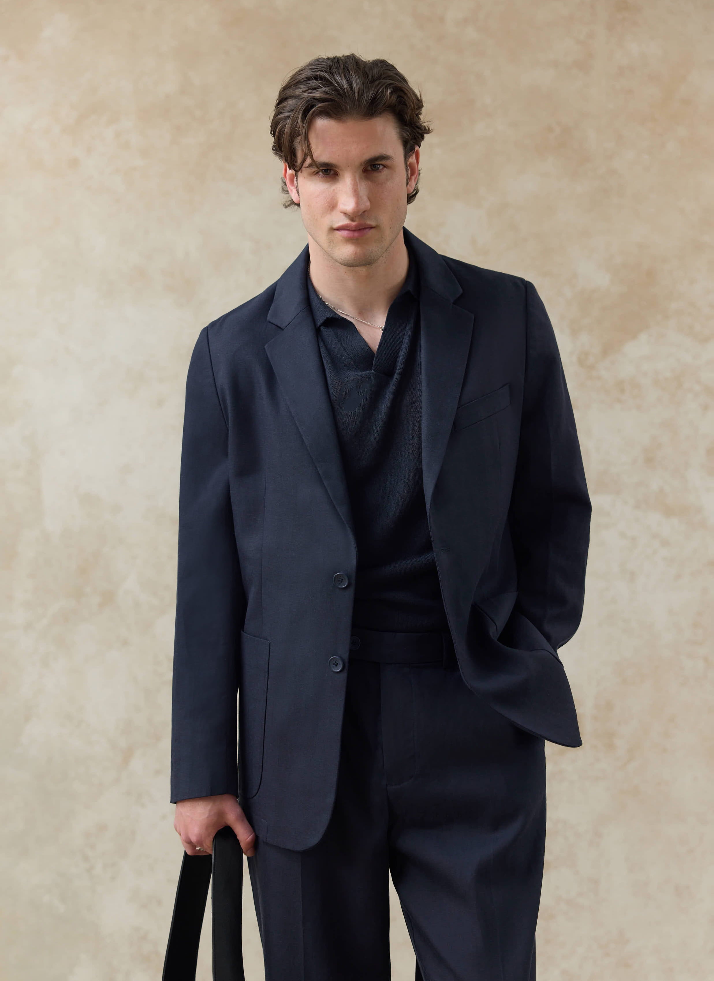 Navy blue Percival Lyocell Regular Blazer on a model, featuring a refined and softly structured silhouette.