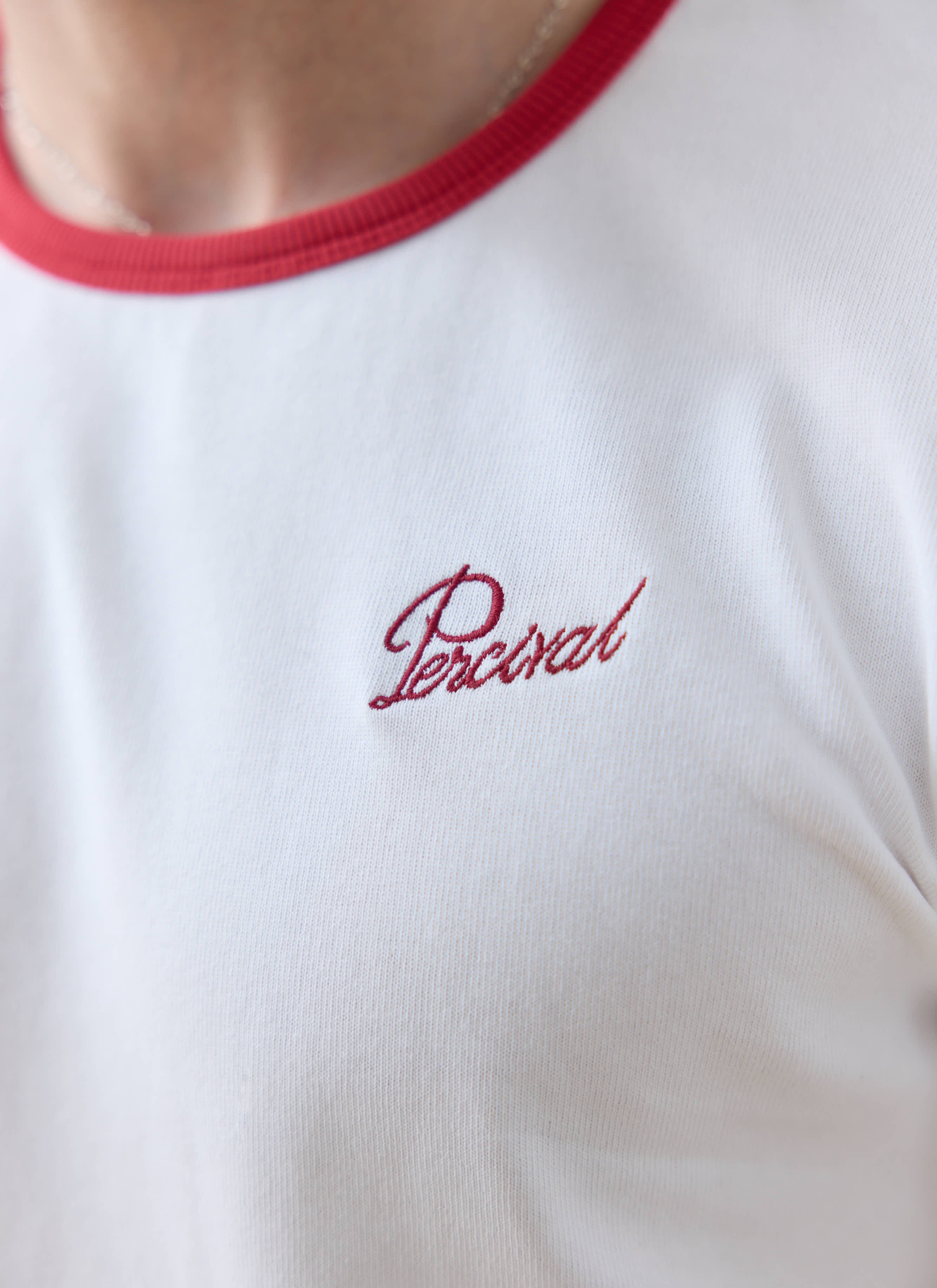Percival white slim fit organic cotton ringer t-shirt with a red logo; want more? Check out our latest SS26 collection.