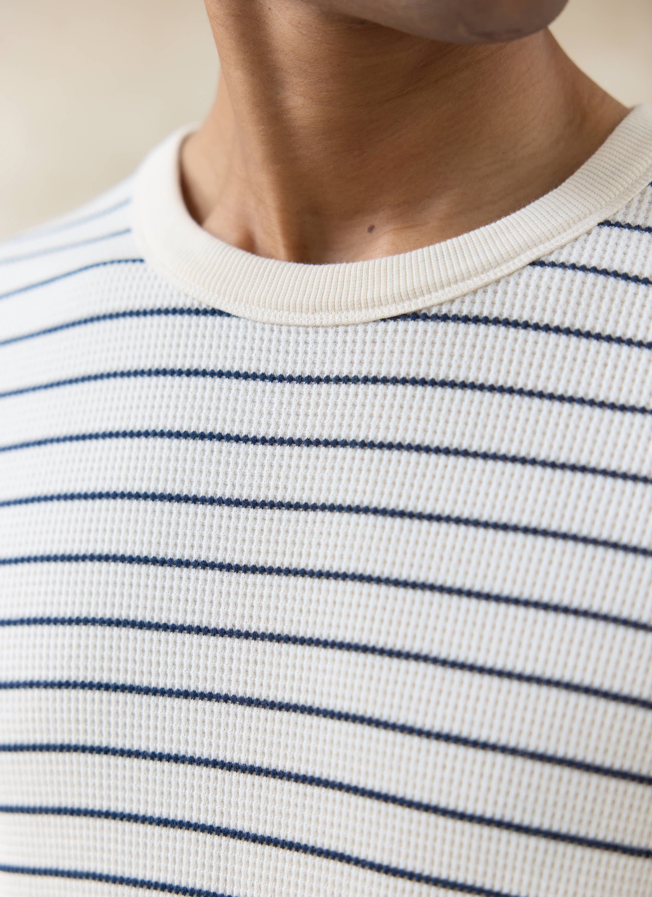 Close-up of the Percival Ernie Waffle T Shirt in cream stripe, showing the textured organic cotton and ribbed crew neck.