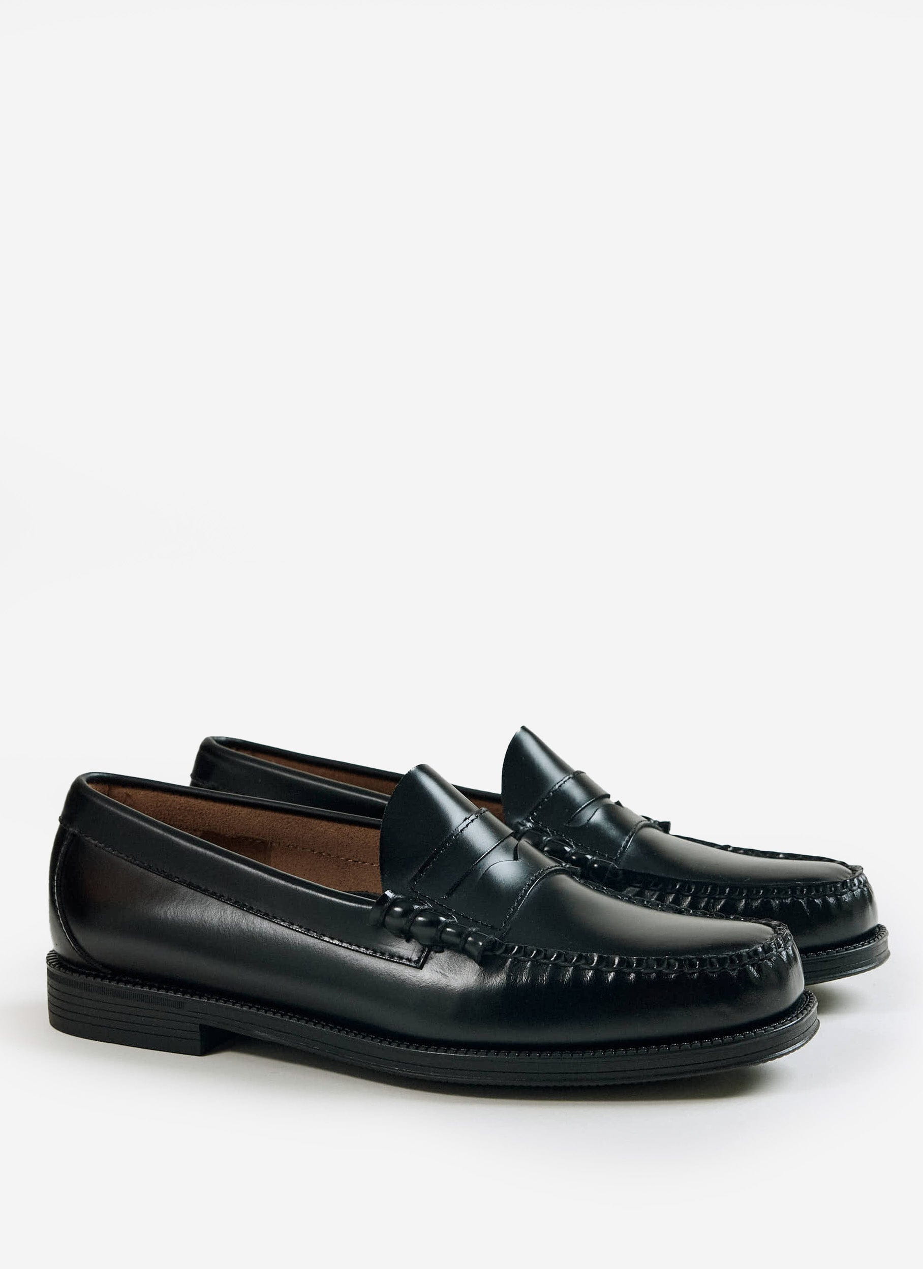 A pair of G.H. Bass Weejun II Larson Moc Penny loafers in black polished leather from Percival.