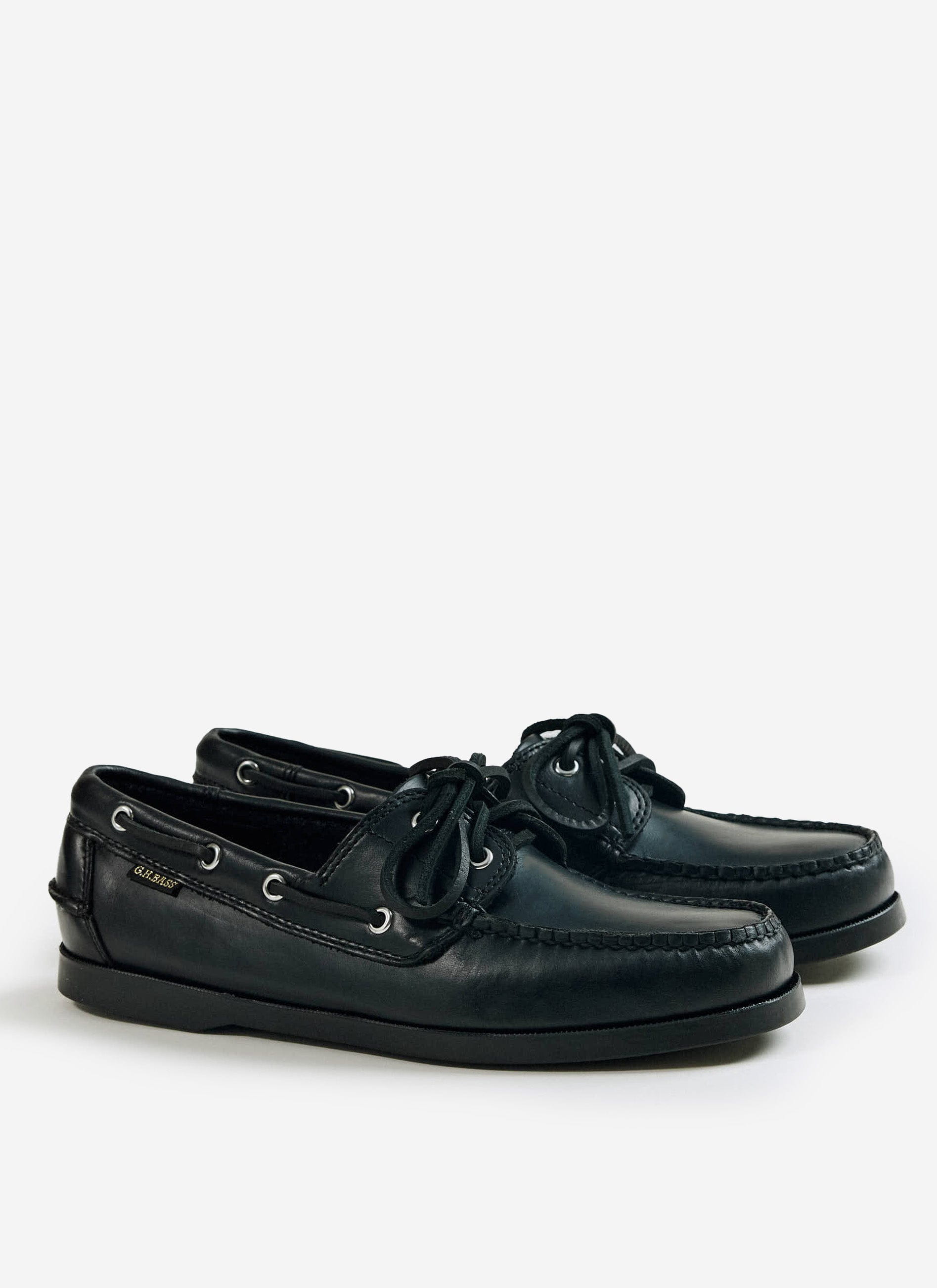A side view of the black leather G.H. Bass Jetty II Boater 2 Eye shoes from Percival.