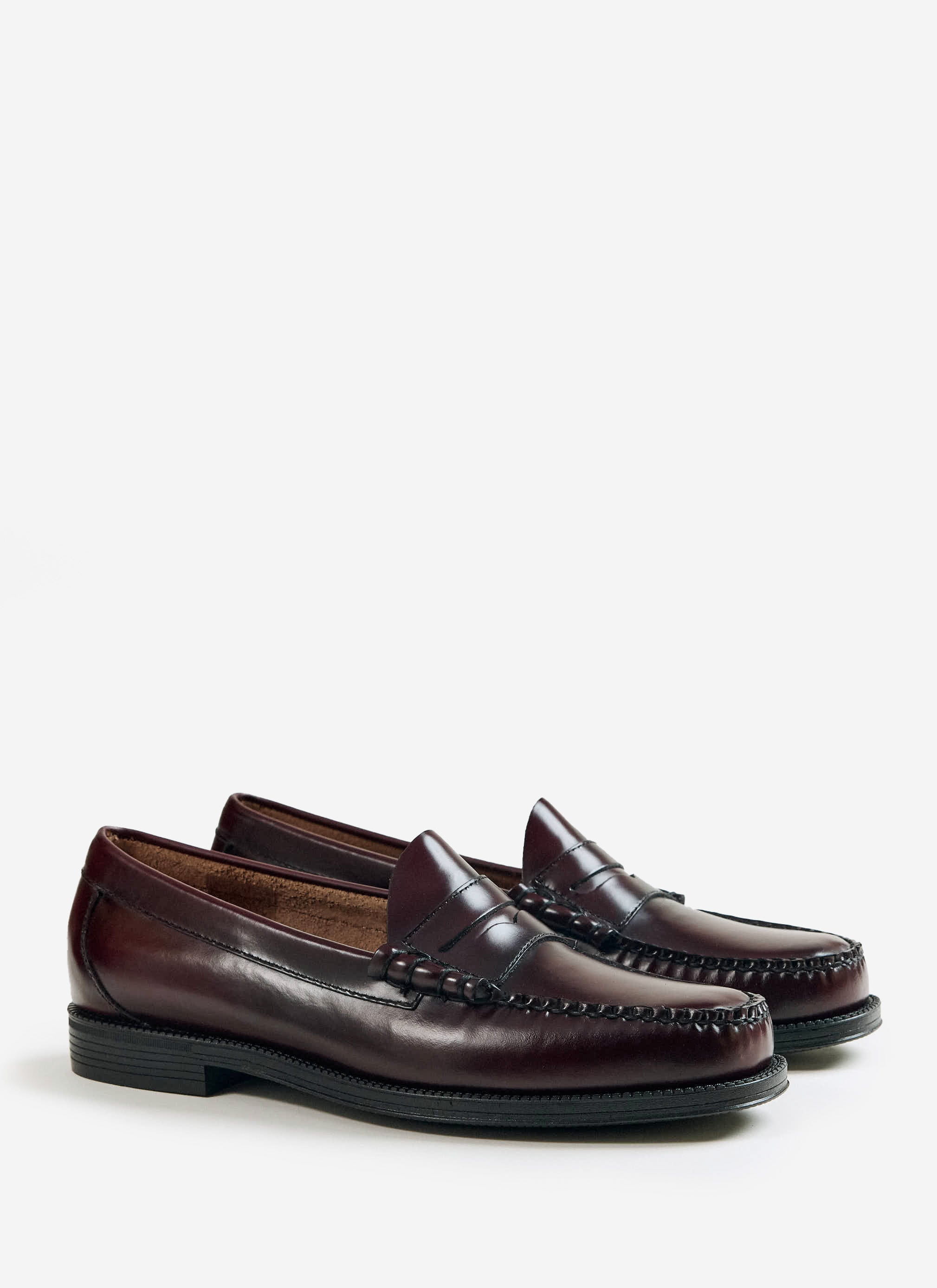 A pair of G.H.Bass Weejun II Larson Moc Penny loafers in wine leather, from Percival.