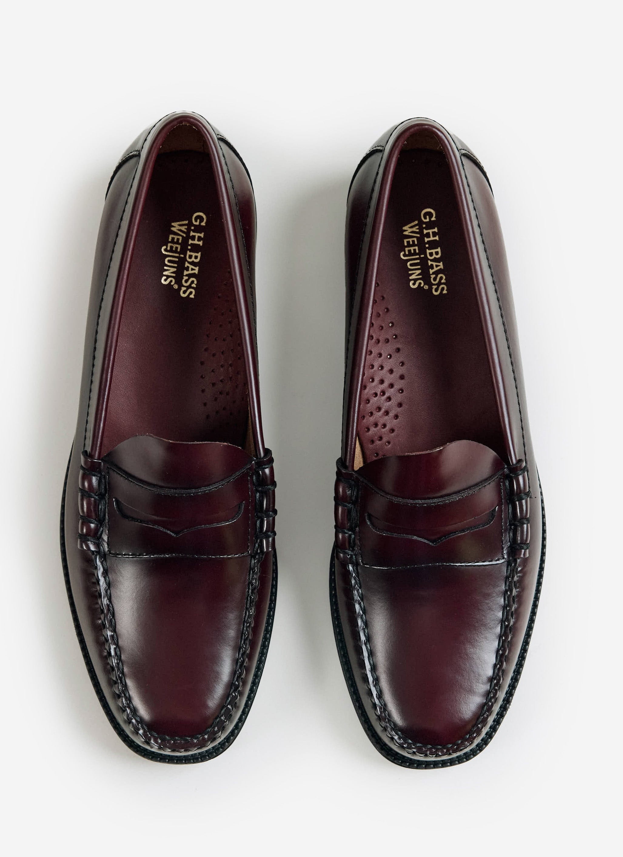 Top-down view of the wine G.H. Bass Weejun II Larson Moc Penny loafers from Percival, showing gold foil branding.