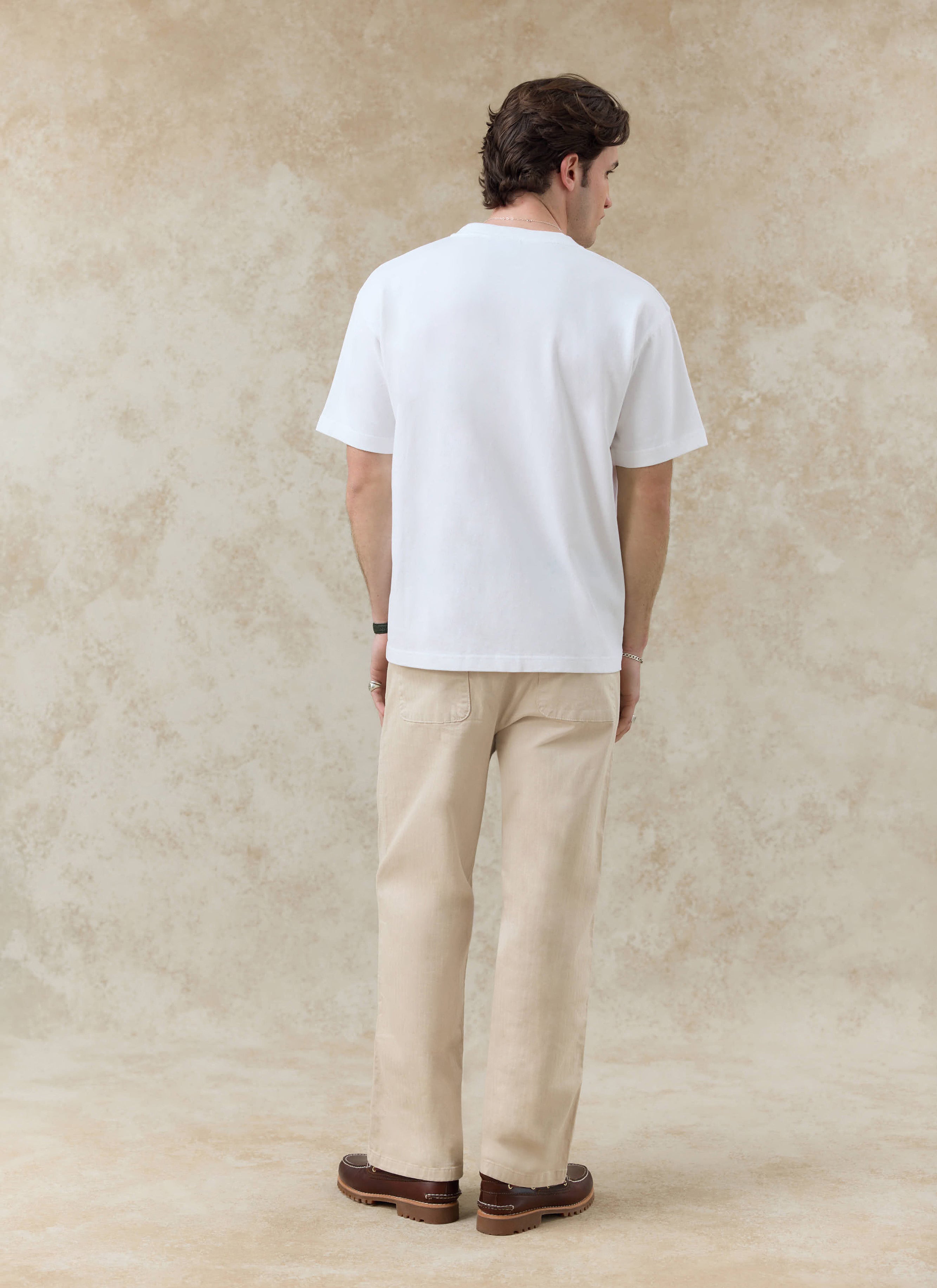 White Percival Robinson organic cotton t-shirt, shown from behind; want more? Check out the SS26 collection.