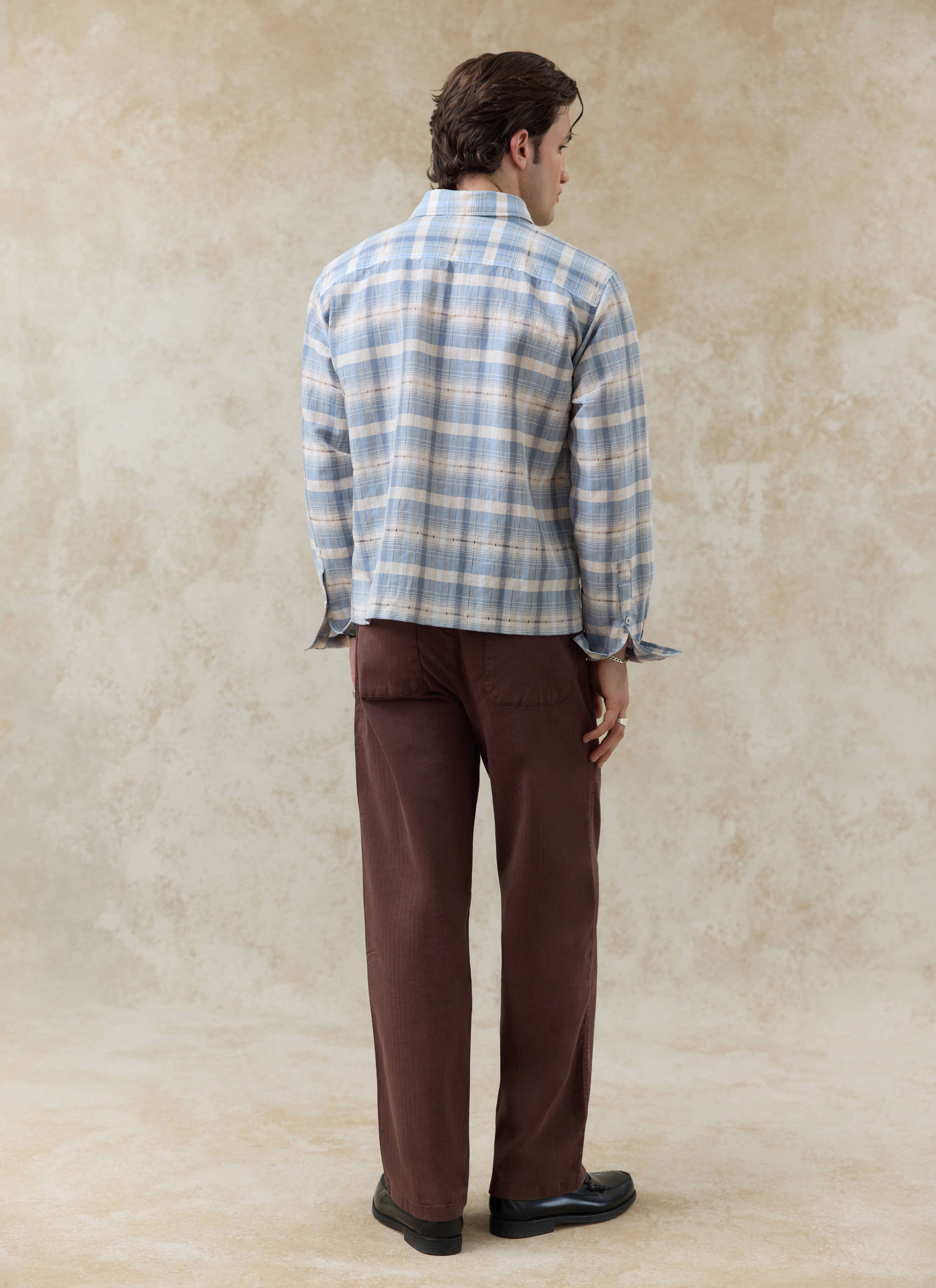 The Percival Jesse Cropped Shirt in blue check linen-cotton blend, shown from the back to highlight the boxy fit.