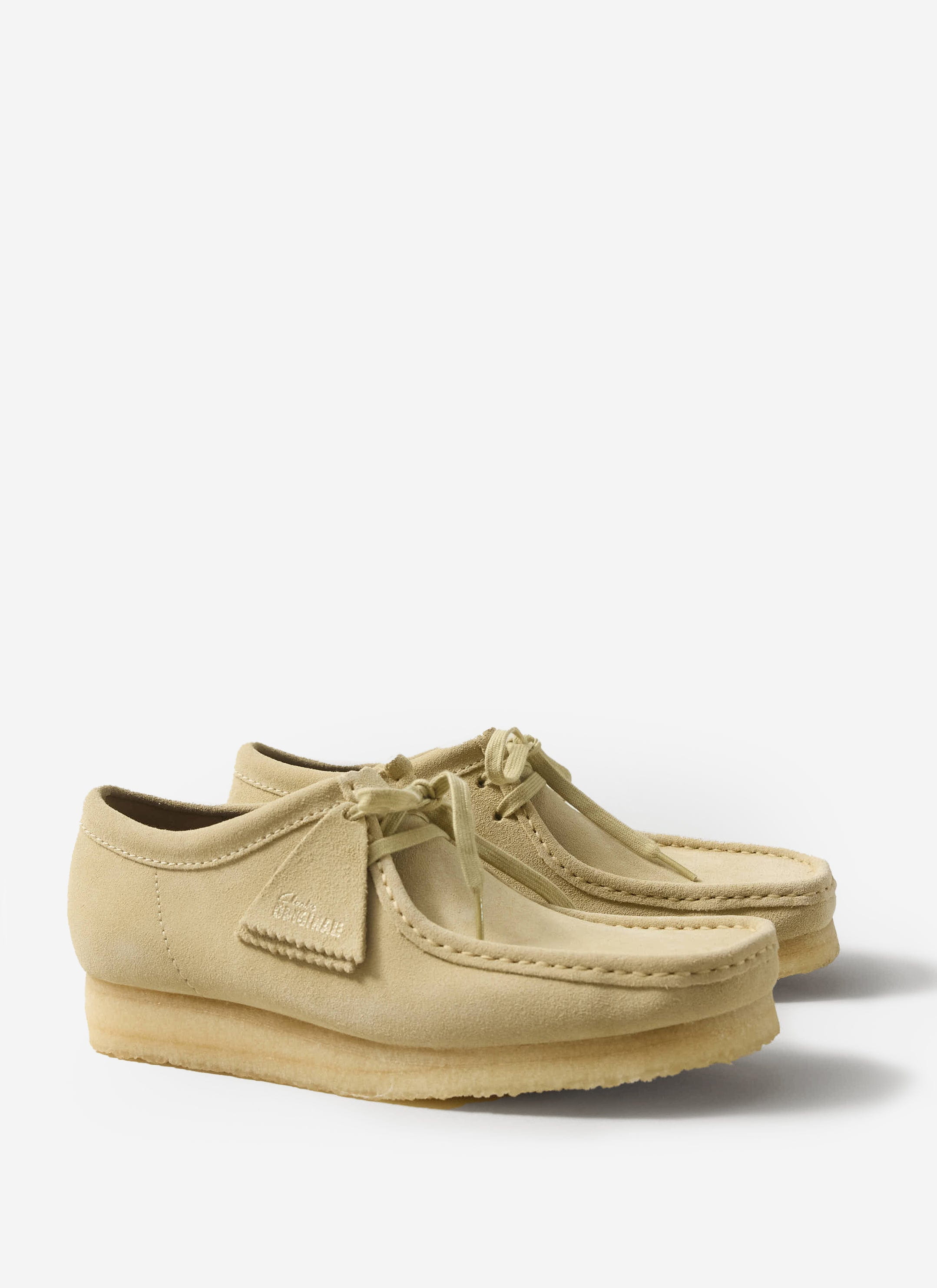 A pair of Percival x Clarks Originals Wallabee shoes in maple suede with a classic crepe sole against a white background.