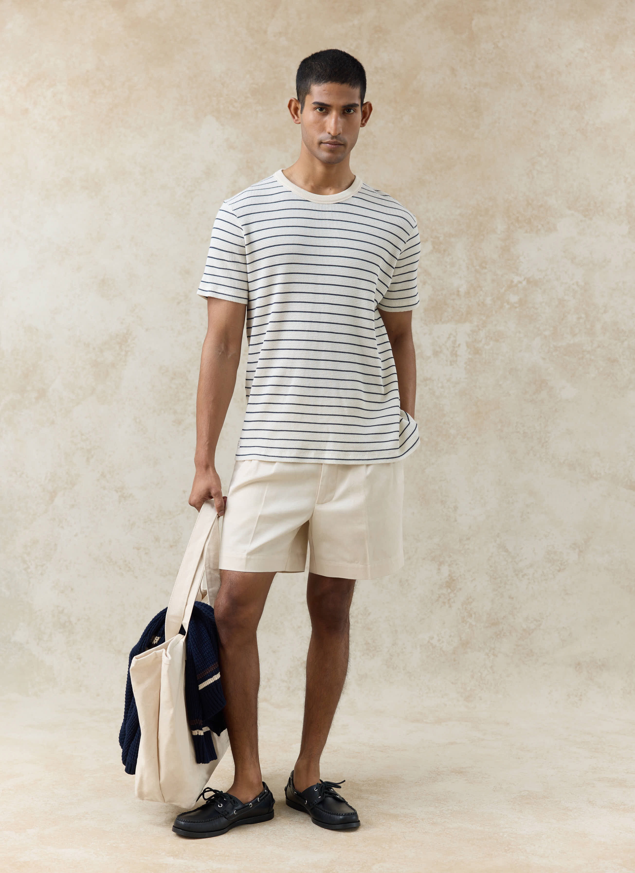 Percival Ernie Waffle T-Shirt in cream stripe, a textured organic cotton tee with navy Breton stripes, worn by a model.