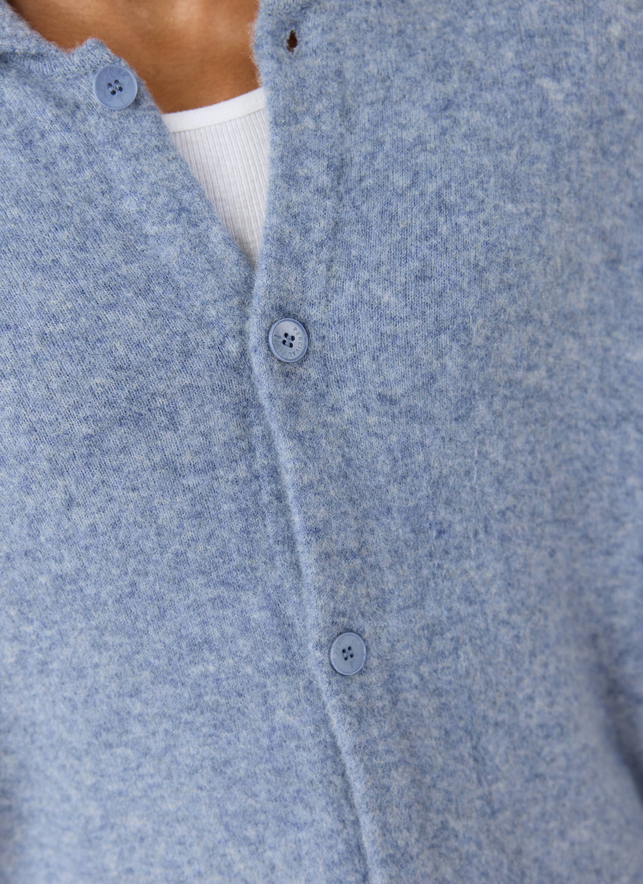 Heather blue Percival yak wool cardigan close-up, showing the soft texture and branded tonal buttons.