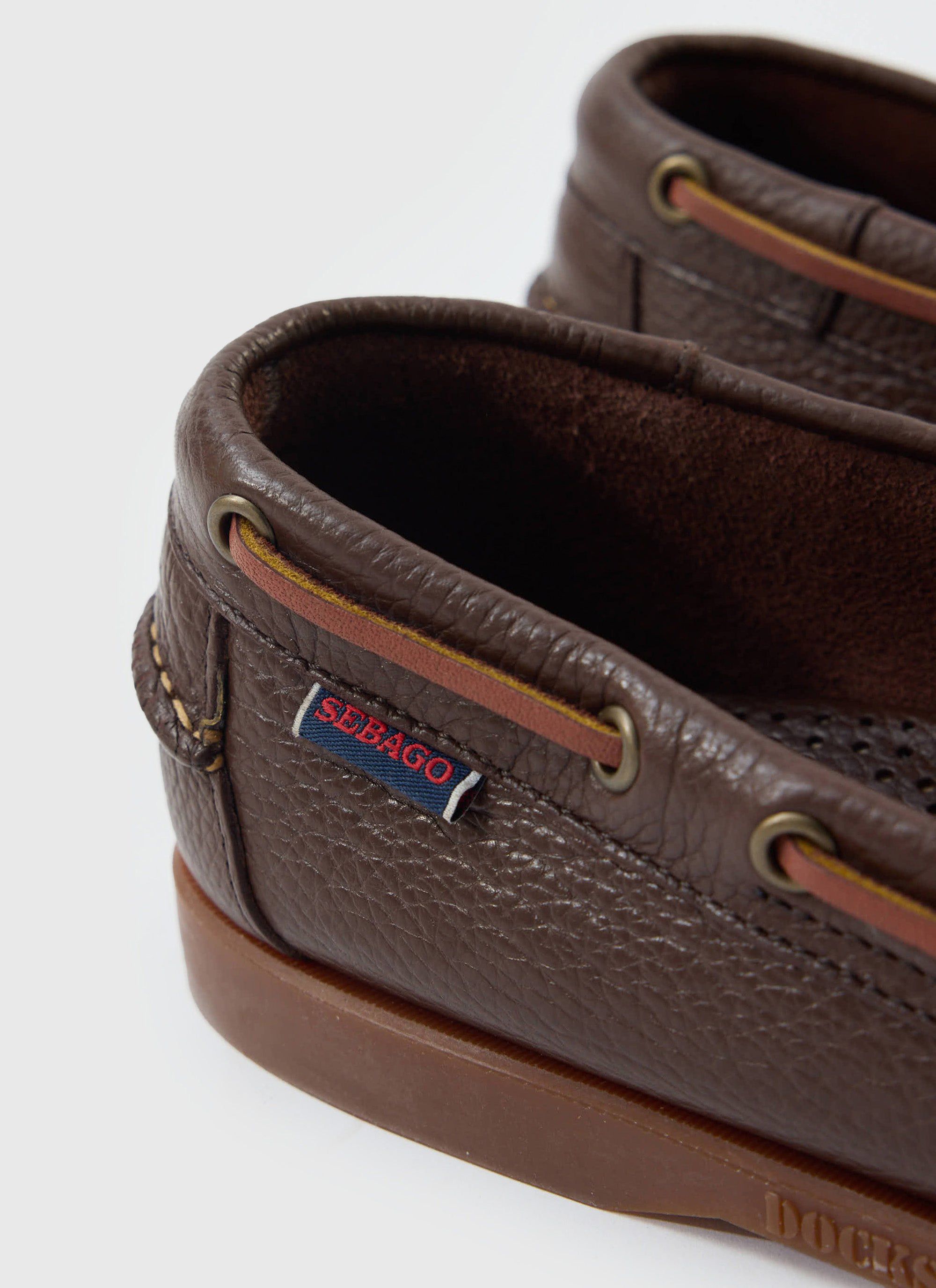 Close up of the brown leather Sebago Boat Shoe from Percival, showing the textured hammered leather and side label.
