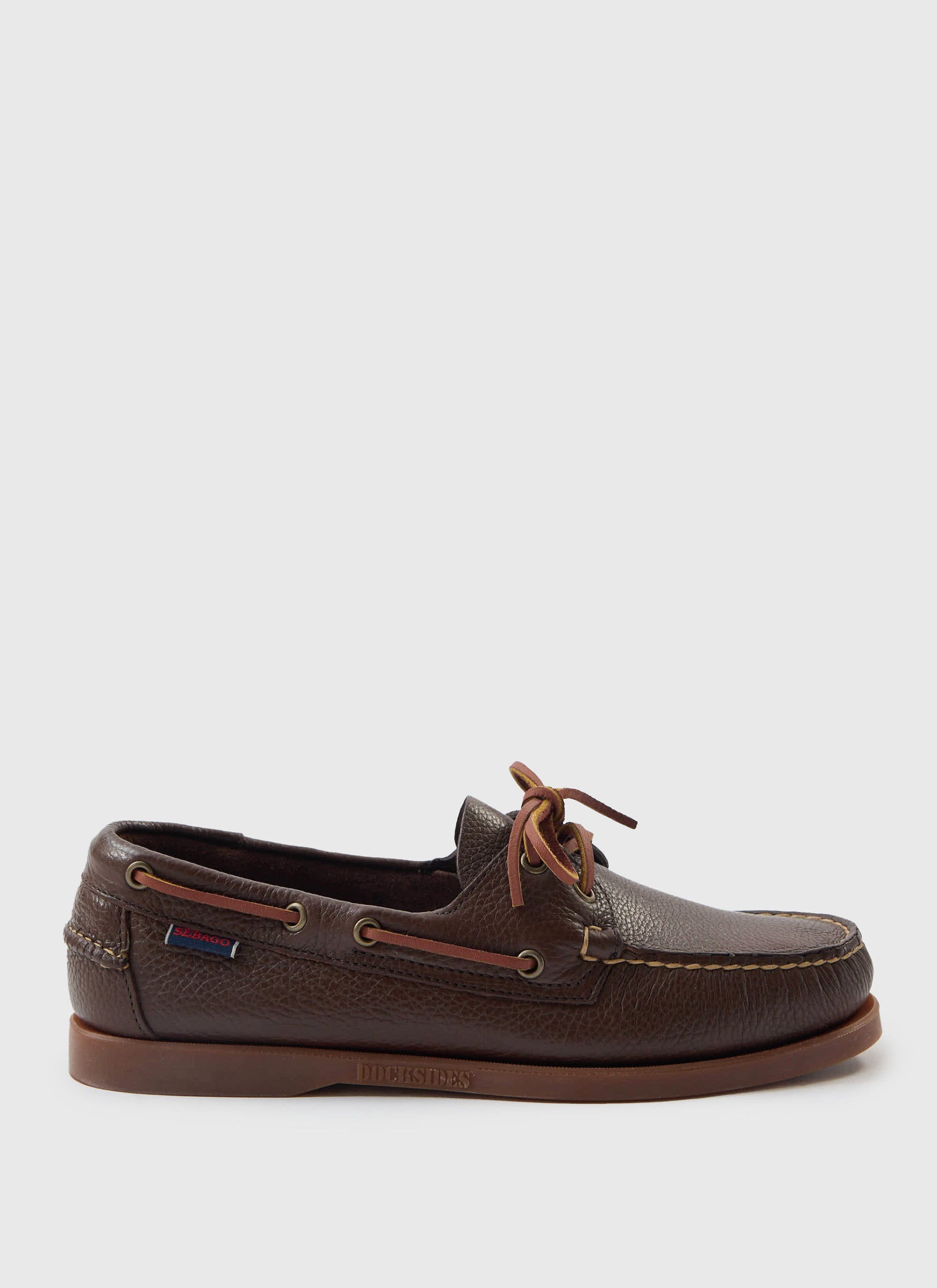 The Percival Sebago Boat Shoe in Brown Cognac Gum, showing the hammered leather texture and gum sole from the side.
