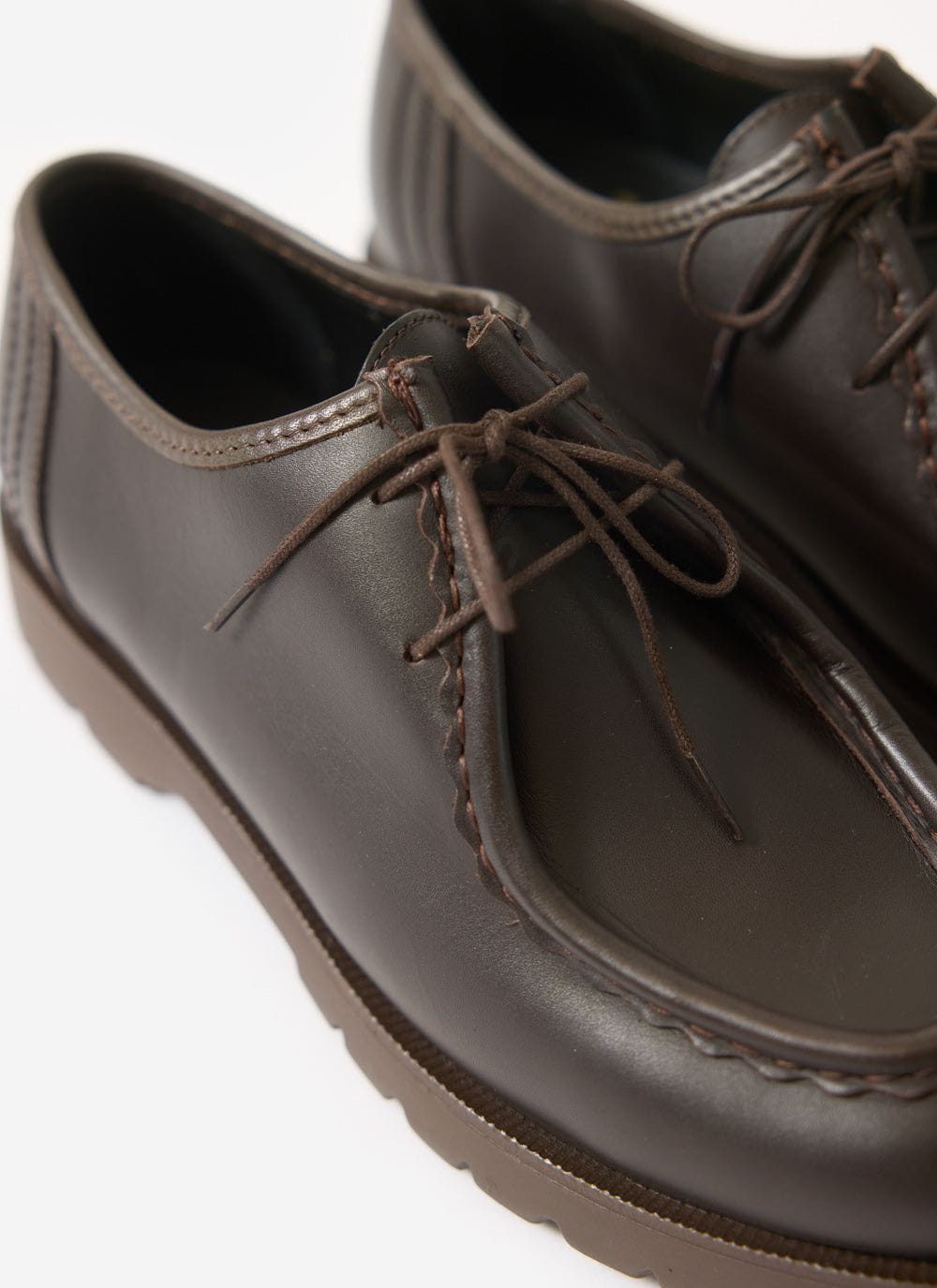 A close up of the Percival Kleman Padror Shoe in marron brown leather, showing the detailed stitching, laces and rubber sole.