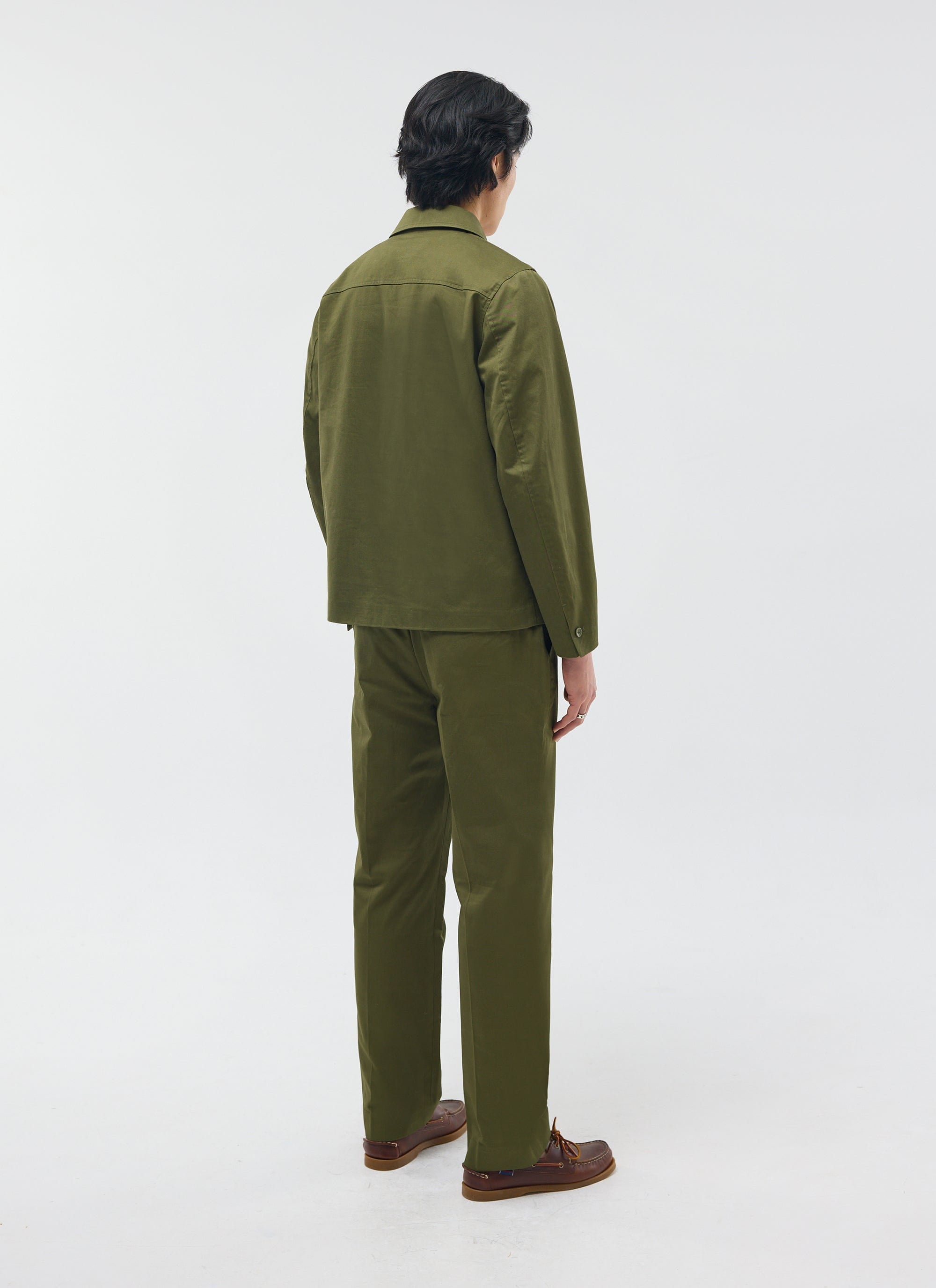 The Percival Casual Workwear Jacket in khaki cotton, shown from behind on a model wearing the full co-ord set.