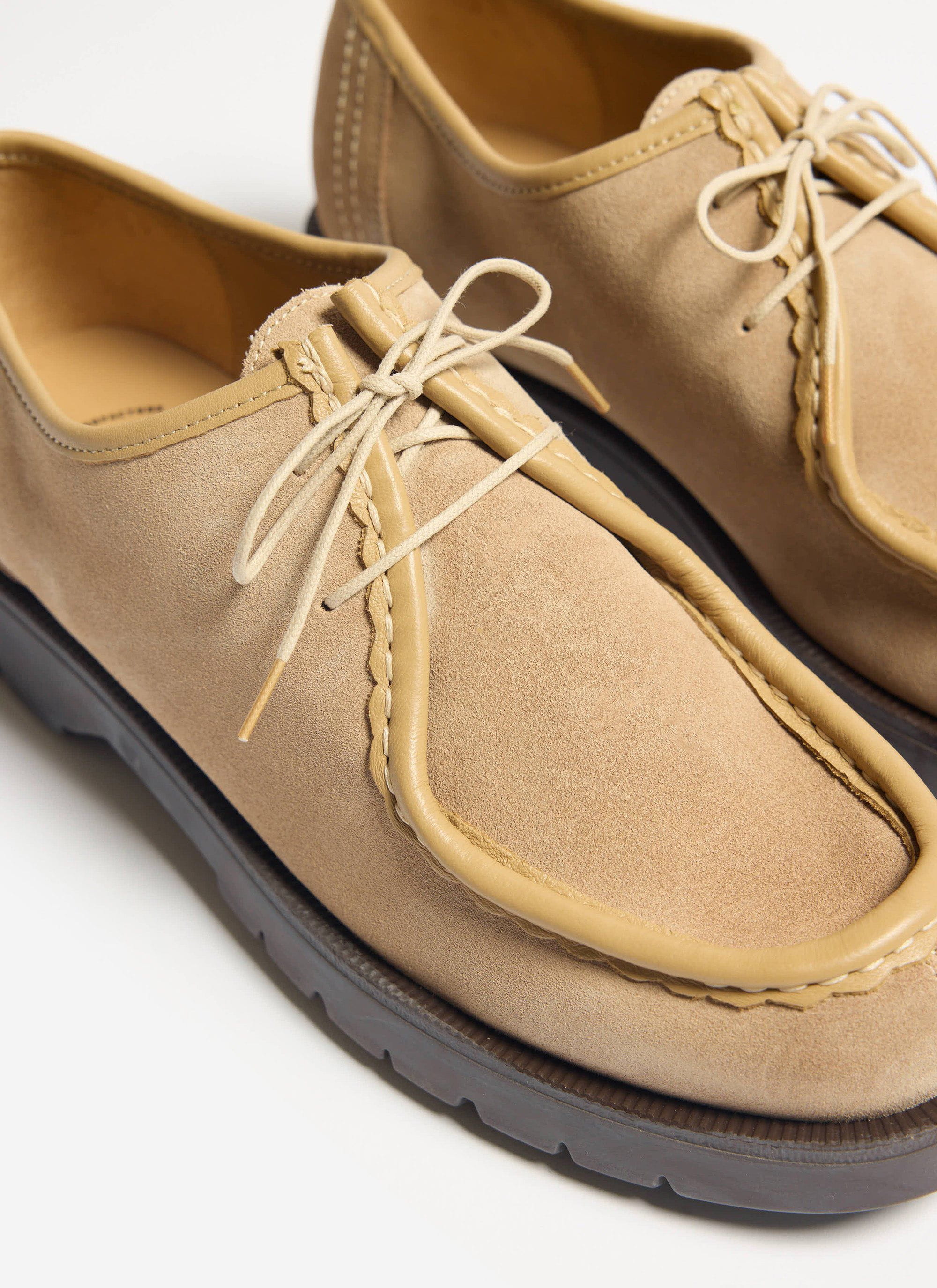 Close-up detail of the Percival Padror V Shoe by Kleman in beige leather, showcasing the serrated hem and fancy stitching.