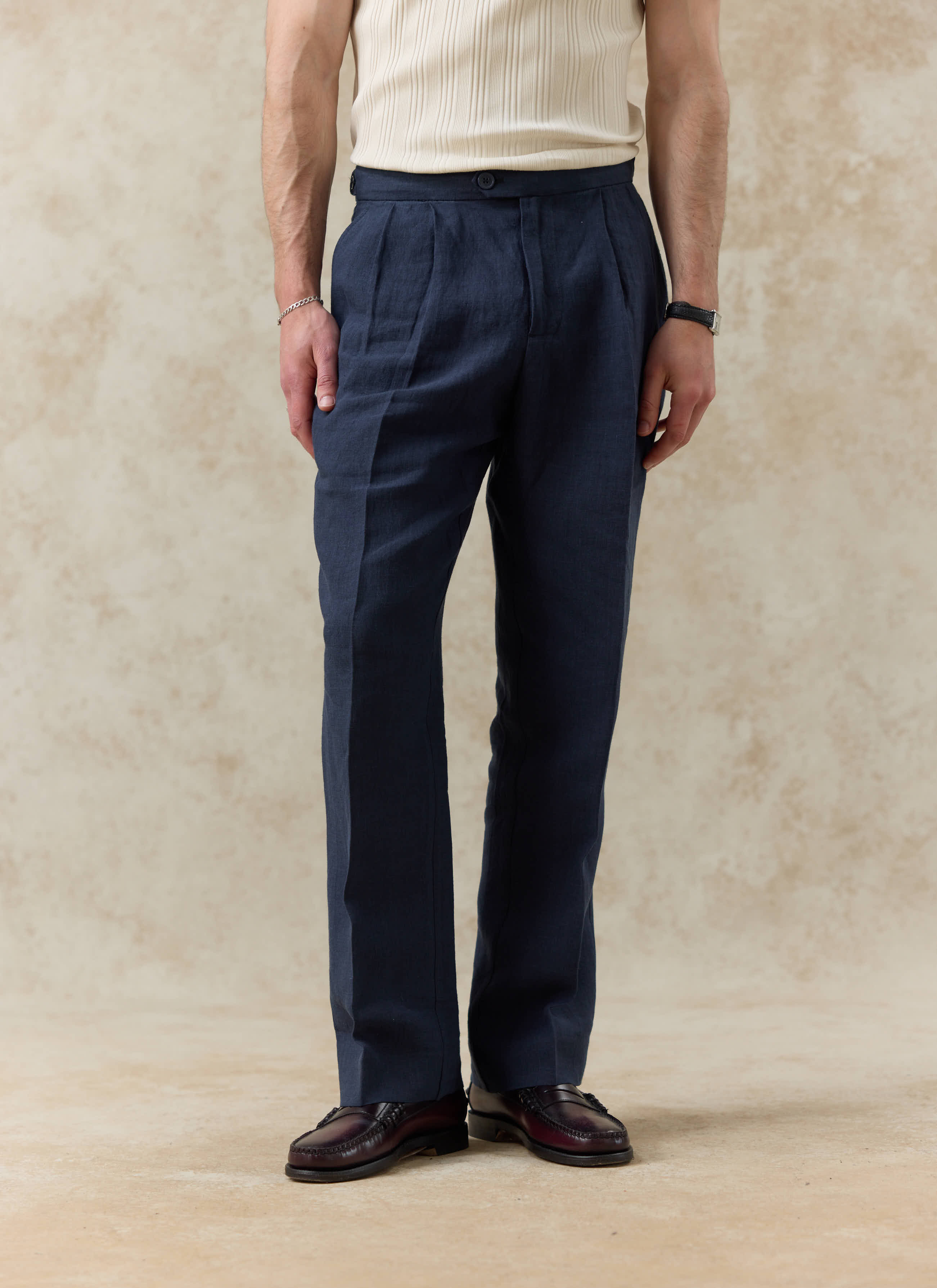Navy blue Percival Pleated Tailored Trousers in 100% linen, featuring a relaxed fit and double pleat front detail.