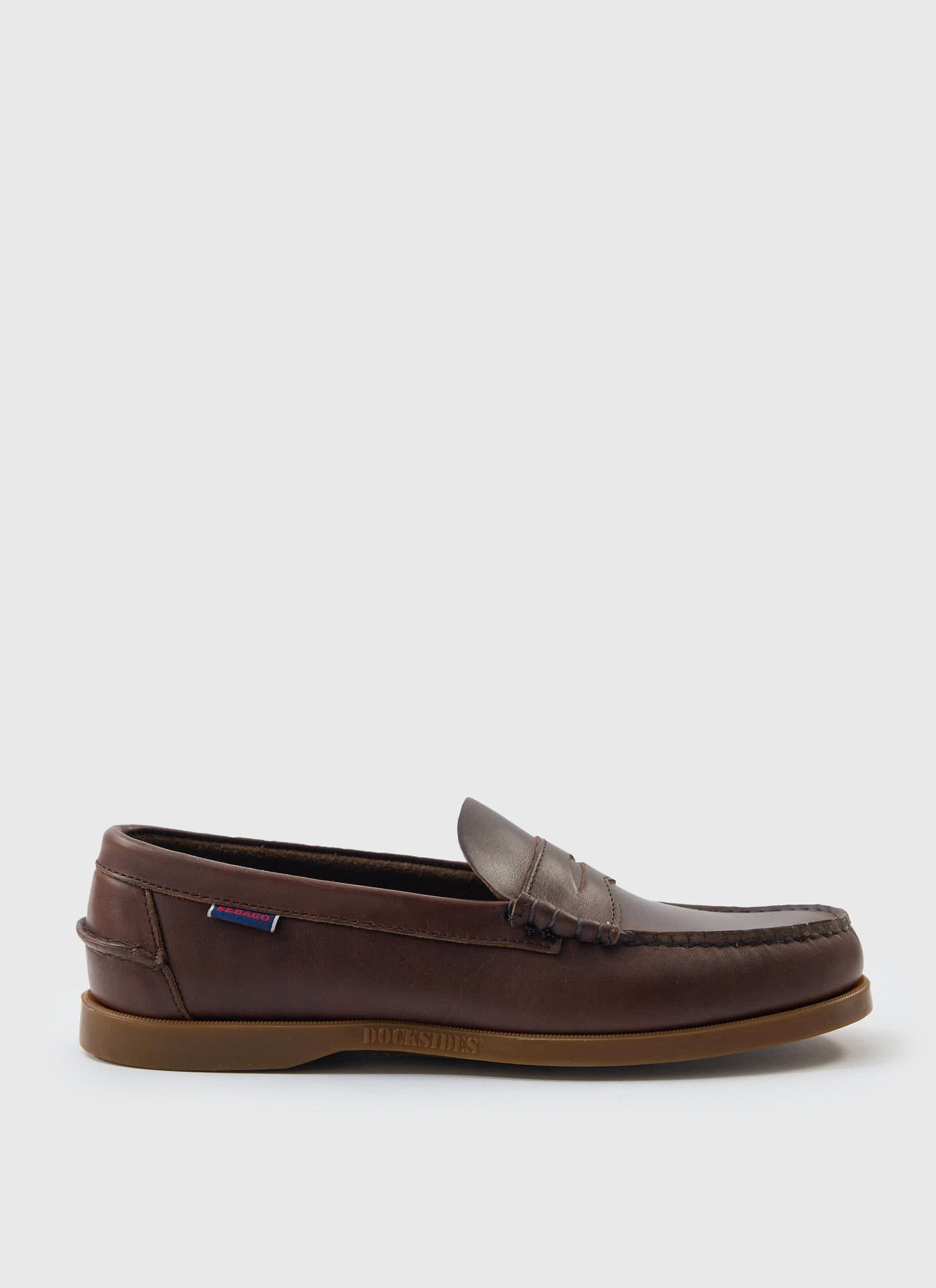 A side profile of the Sebago Loafer in Dolphin Waxed dark brown leather, available to purchase from Percival.