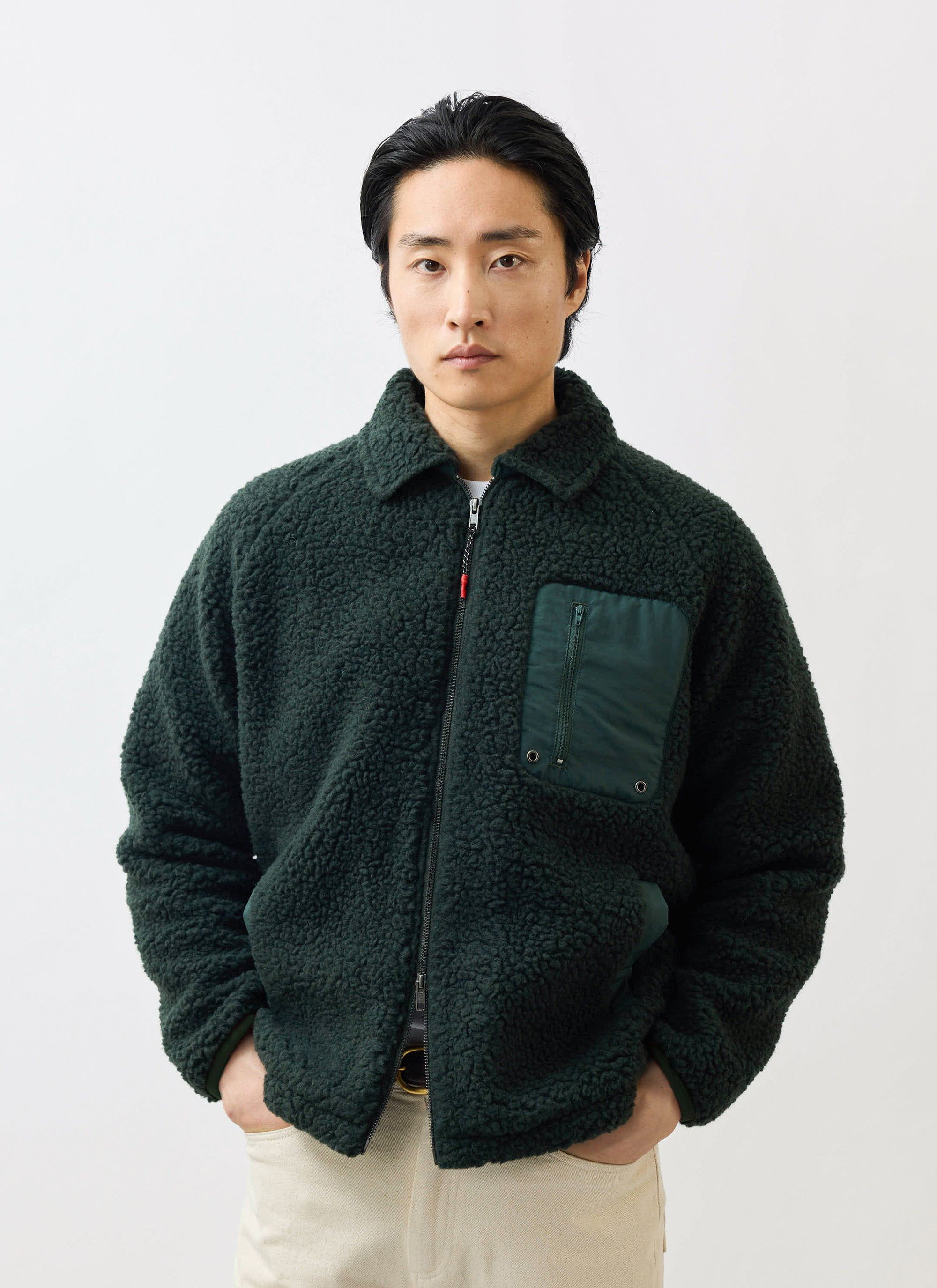 A model wears the Percival Men's Wool Fleece Jacket in Forest green against a clean white studio background.