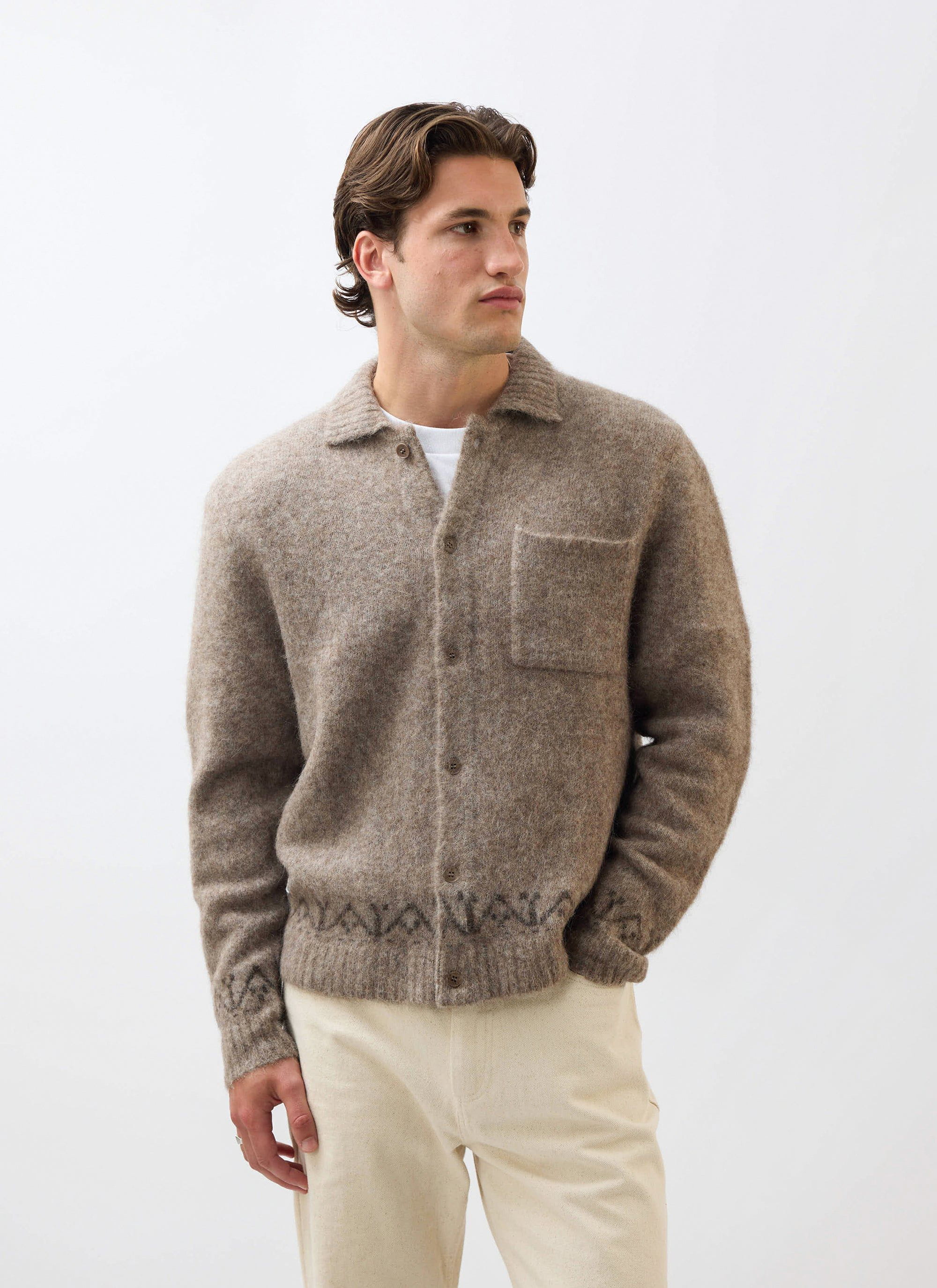 A model wears the Percival Novel Collared Cardigan in oak, a soft wool-blend knit, styled with light-coloured trousers.