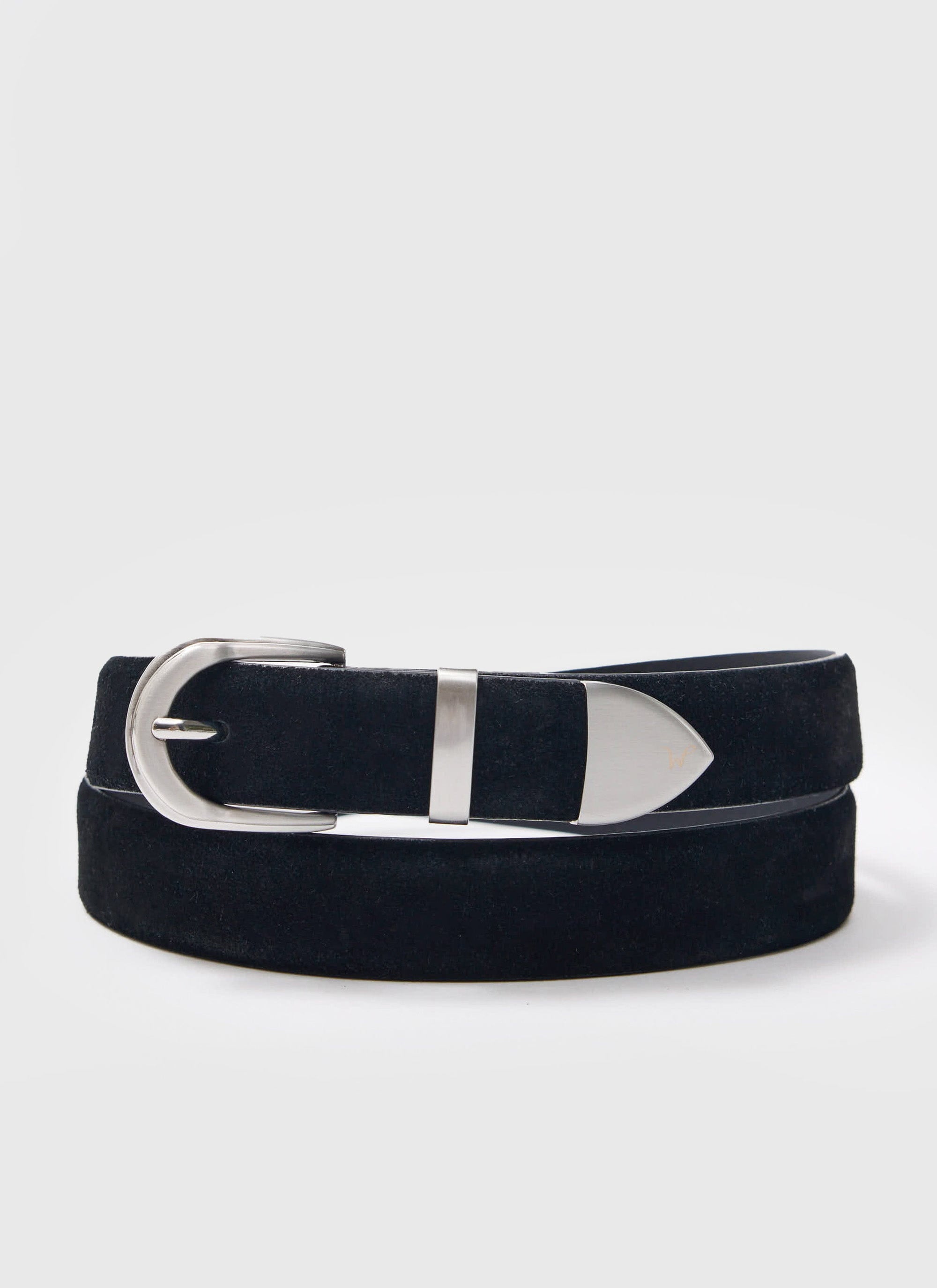 A coiled black suede western-style belt with a silver buckle and tip from the Percival x Warren collection.
