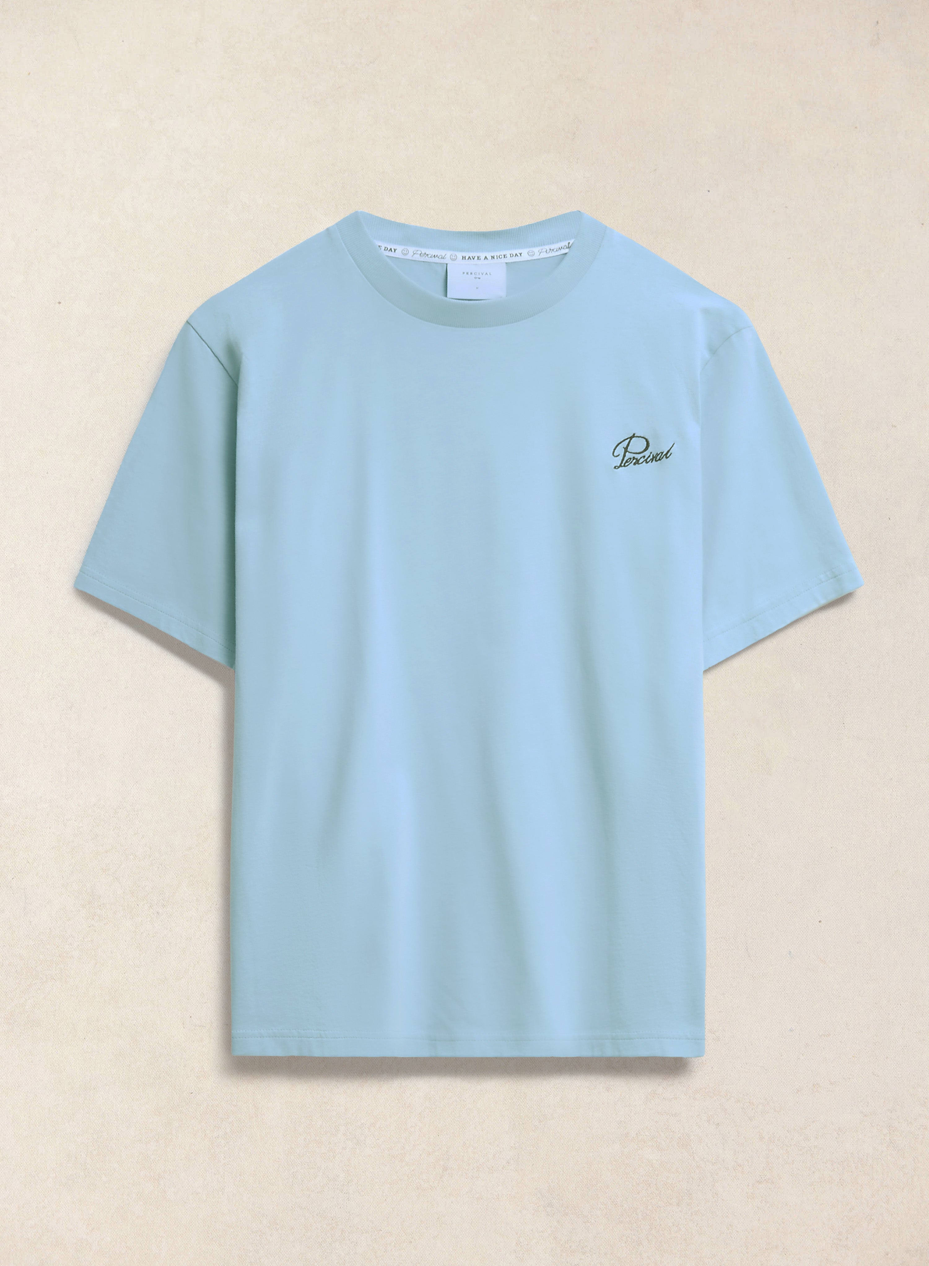 Light blue Percival Perci Script embroidered t-shirt in organic cotton, shown flat against a textured background.