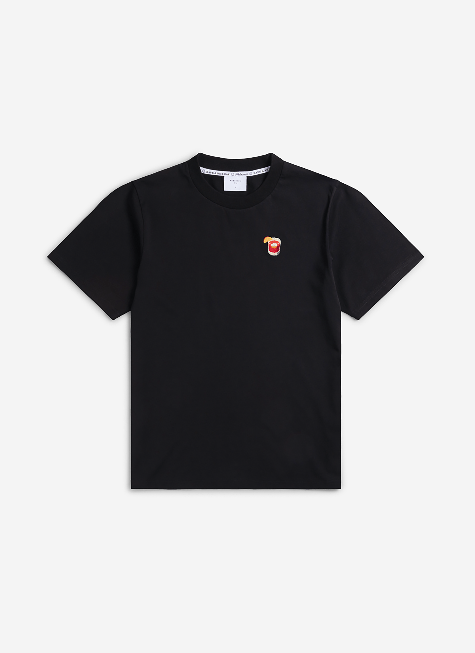 The Percival Negroni T-shirt in black organic cotton, laid flat to showcase the embroidered cocktail on the chest.
