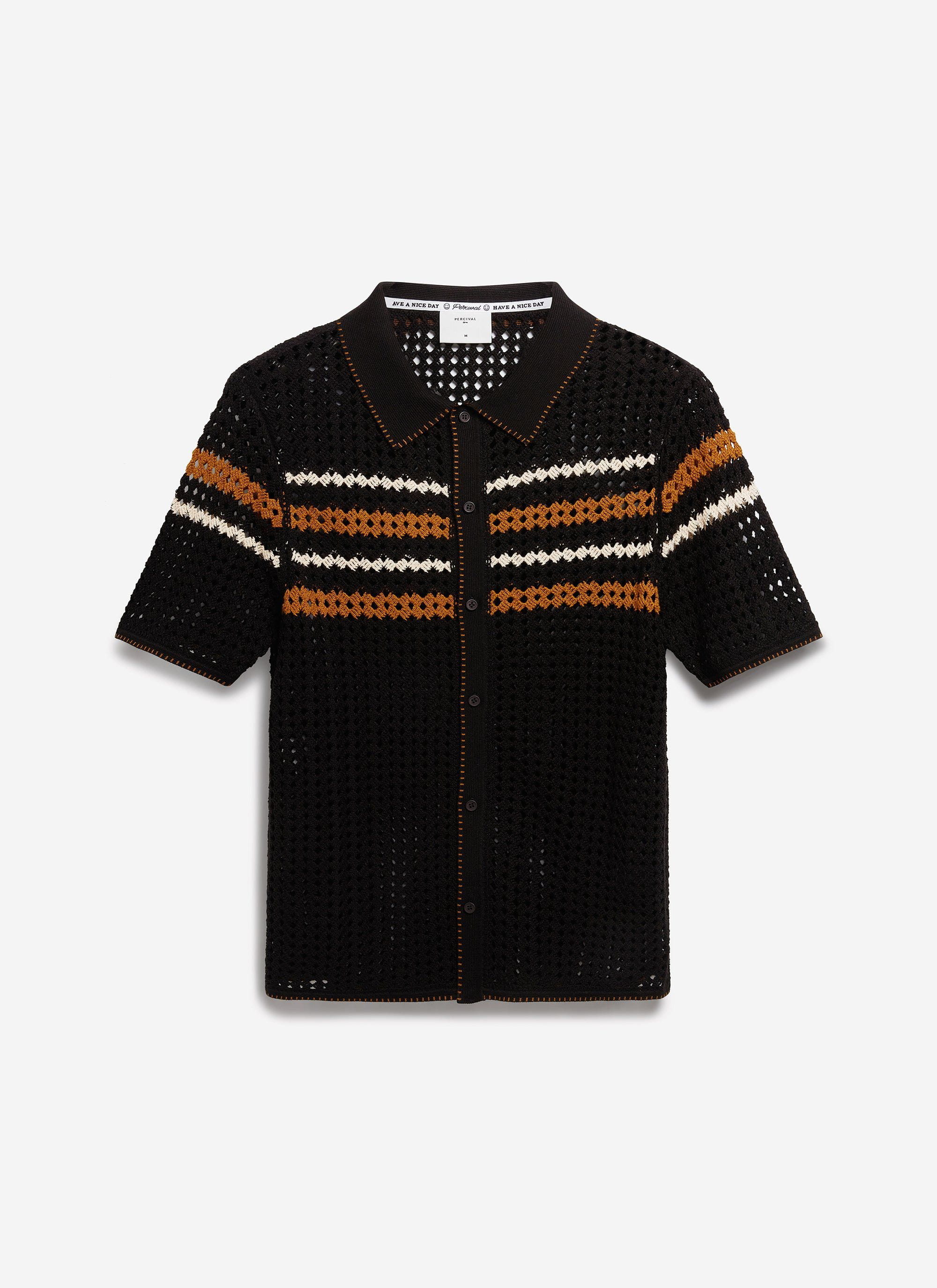 The Percival Pesaro Knitted Shirt in black cotton, laid flat to show the crochet design and striped chest detail.