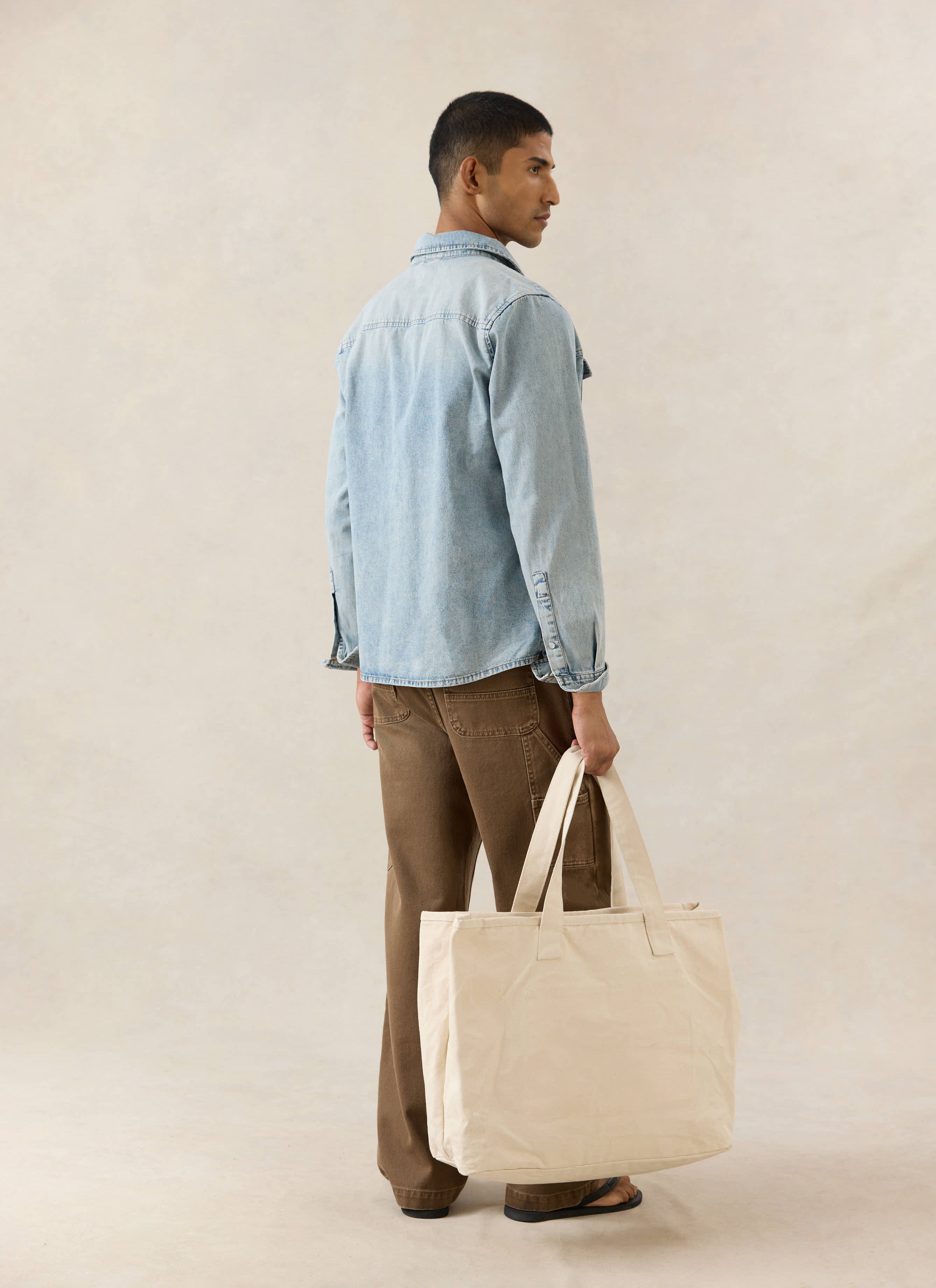 Percival stone wash denim Vintage Wash Western Shirt, shown from the back on a model wearing brown Lucas carpenter trousers.